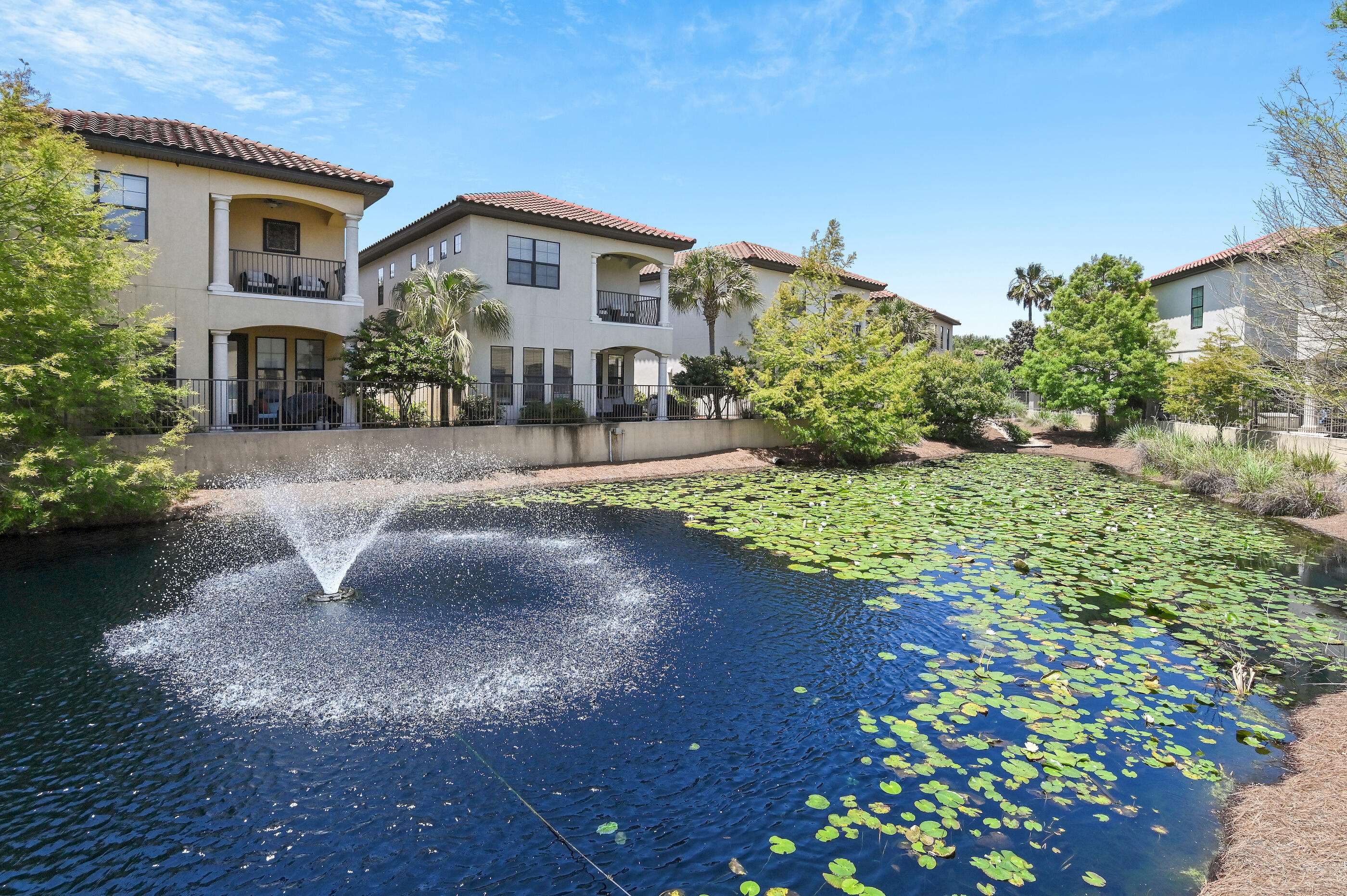 With a $65K-$80K rental projection, this Villa Lago home arrives at closing as a complete, operational property inside one of Sandestin Golf and Beach Resort's most well-regarded communities, with no transition period between possession and productive use. Four bedrooms. Four bathrooms. Fully furnished. Two golf carts included. Short-term rentals allowed. The home reflects the Mediterranean architecture that defines Villa Lago, a purposeful design departure from the coastal cottage styles prevalent elsewhere along the Emerald Coast, and the interior finishes hold up to both daily owner life and the demands of a managed rental program. Travertine and hardwood floors run throughout. 10' ceilings are adorned with crown molding. Granite countertops finish the kitchen and all four bathrooms.

The layout gives each of the four bedrooms enough separation and privacy to function as a true guest suite, a detail that matters whether you're hosting family or managing a rental calendar. The private, enclosed garage, uncommon in most Sandestin STR neighborhoods, is a differentiator for guests who arrive with gear, bikes, and beach equipment that needs a place to live during a week-long stay. The included golf carts live in that garage as well, and it fundamentally changes the daily experience of being here - Baytowne Wharf's restaurants, boutiques, and live entertainment are minutes away without touching a car. The resort's complimentary beach tram to the Gulf is an easy ride from the neighborhood. Baytowne Golf Course borders Villa Lago directly, and Sandestin's golf course portfolio is accessible as a resort resident.

Villa Lago maintains a private community pool and clubhouse exclusively for neighborhood residents, separate from the broader resort amenity network. That broader network adds resort pools, tennis and pickleball facilities, a full marina on Choctawhatchee Bay, and the dining, shopping, and seasonal event programming that Baytowne Wharf and 2,400 acres of master-planned infrastructure support. Grand Boulevard at Sandestin extends the lifestyle further with additional retail and upscale dining. Silver Sands Premium Outlets sits just west of the resort. Ascension Sacred Heart Emerald Coast is 2.5 miles. The airport is 25 miles.

The Sandestin rental market is consistent and deep, driven by proximity to the Gulf, golf courses, and a resort infrastructure that attracts repeat visitors year after year. A furnished, garaged, golf-cart-equipped four-bedroom in a Mediterranean enclave enters that market with real competitive advantages.

Recent updates include two new HVAC units (2025), new furniture and area rugs in the loft and family room (2025), new wall decor and accessories throughout (2026), and new lighting (2026). This home is ready to work from day one. Call today for your private tour!