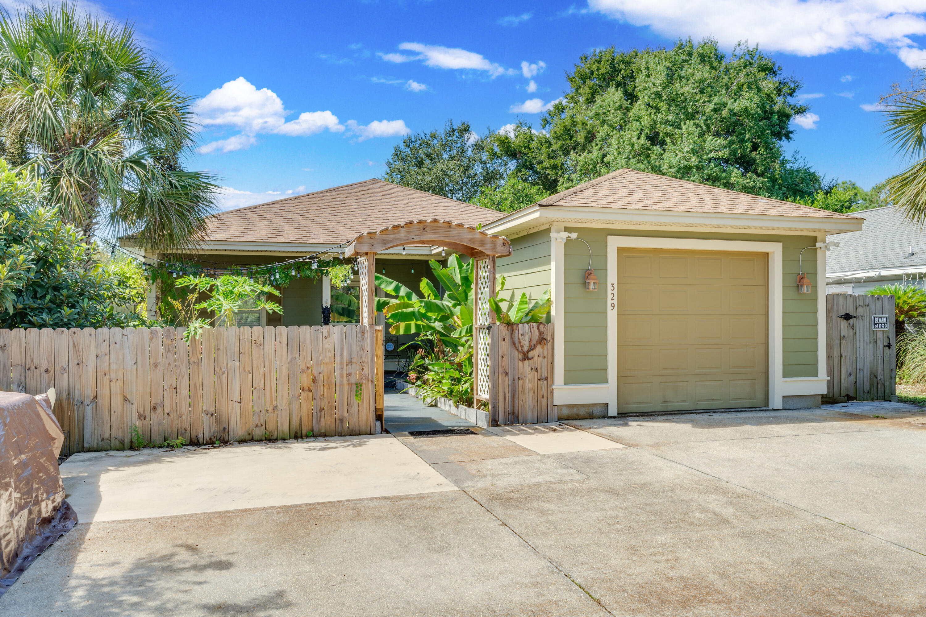Charming Home in Destin
This Destin home offers an inviting outdoor space with lush landscaping and a private backyard. Inside, you'll find an open floor plan, spacious living areas. The covered patio and fenced yard provide a perfect spot for relaxing or entertaining. Conveniently located near local amenities and the beach.