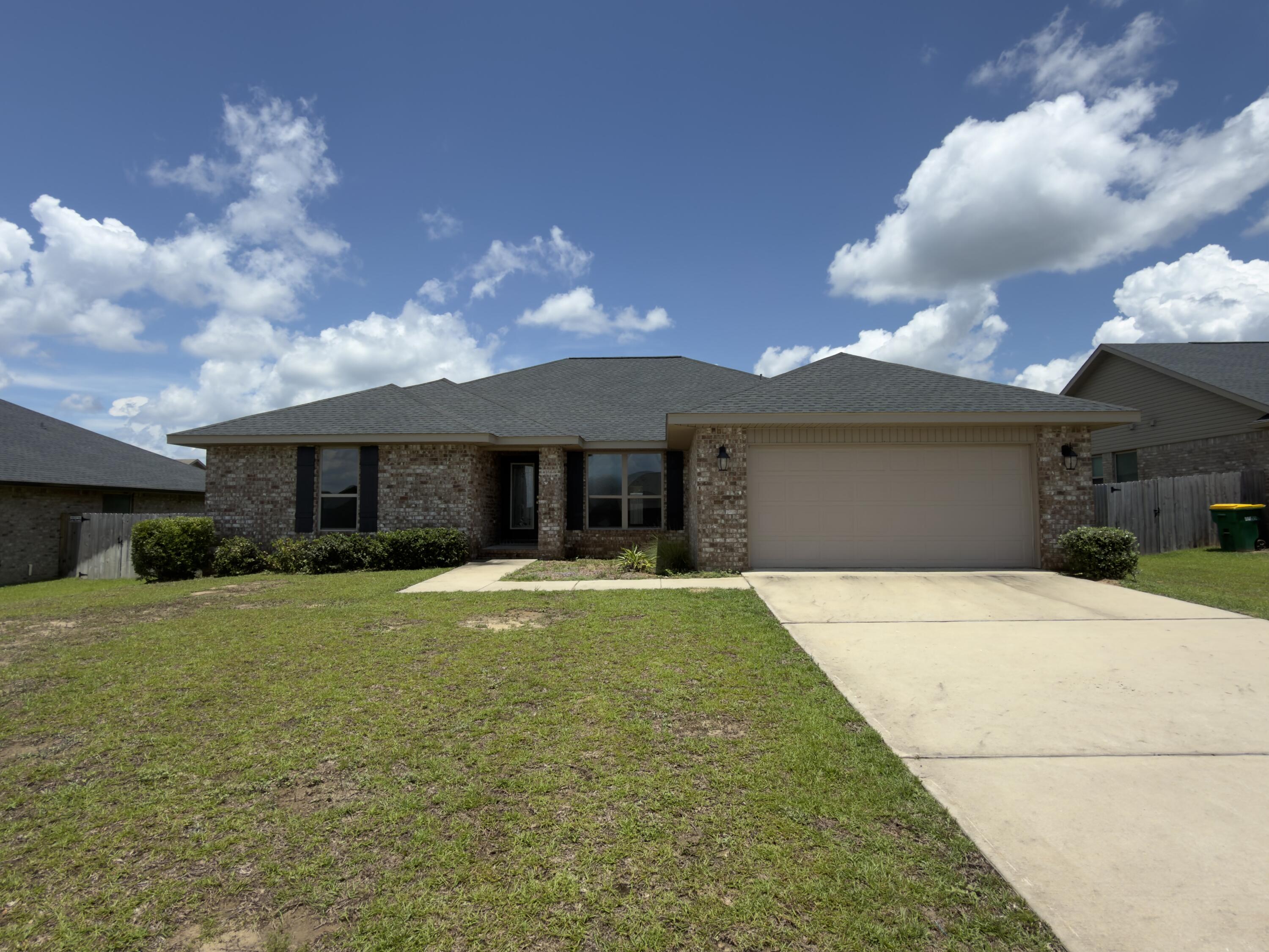 Fantastic REO opportunity you will not want to miss! Built in 2022, this all-brick home is in ready for its new owners. This home has a split-bedroom floor plan with the master suite just off the main living area. Bedrooms two and three share a convenient Jack-and-Jill bathroom, while a separate third full bath sits adjacent to the fourth bedroom--perfect for guests or an office setup. A large island separate the kitchen and living room in this open great room design, complemented by a separate breakfast nook and a formal dining area for easy entertaining. Luxury vinyl plank (LVP) flooring runs through all the high-traffic main living spaces, with carpet featured in the bedrooms. Very little has changed since this home was constructed, meaning it still feels remarkably fresh. This property qualifies for the FHA $100 down program and is classified as FHA IE (Insurable with Escrow). Don't let this one pass you by--call today to schedule your viewing!
