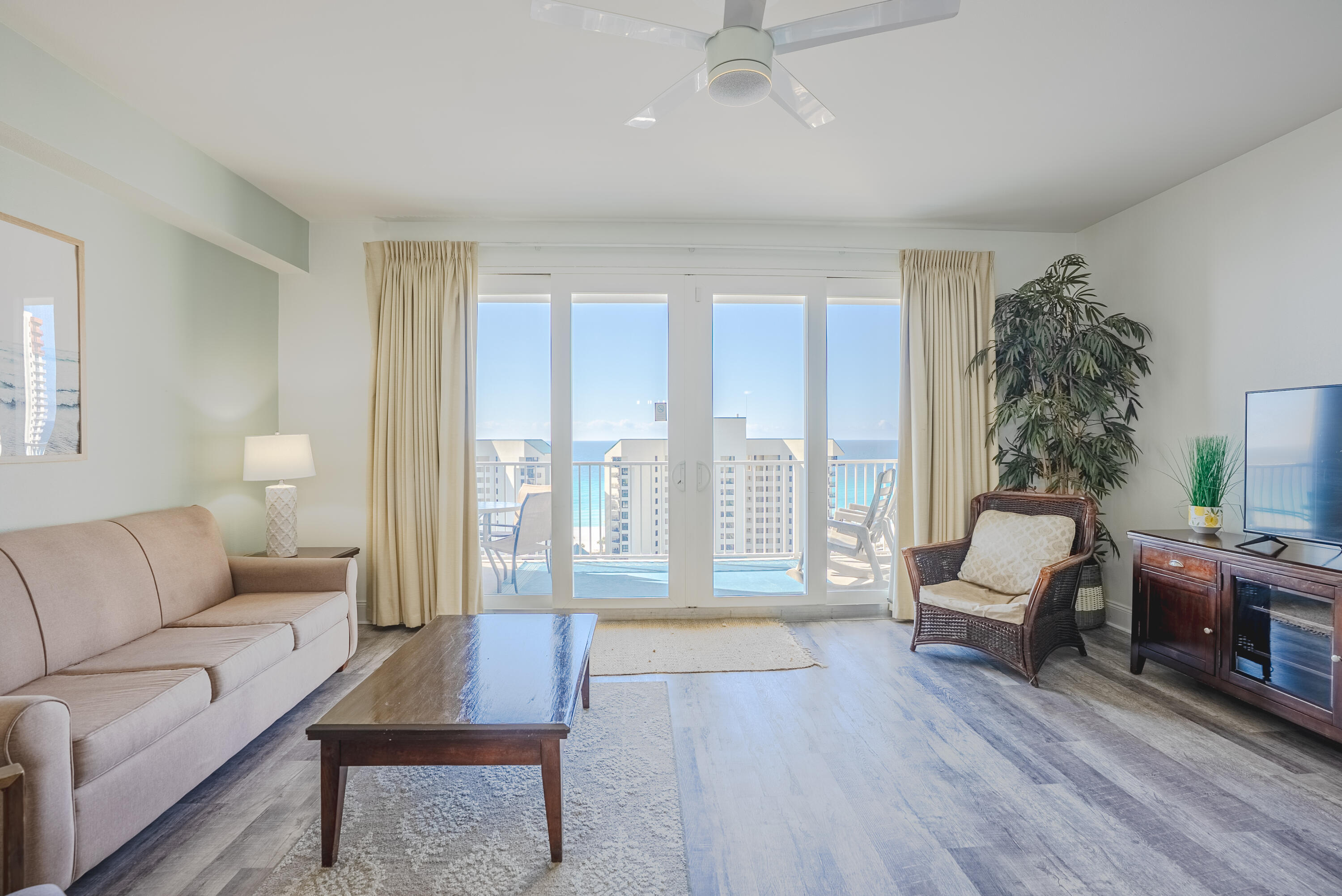 Welcome to Unit 1116 at Laketown Wharf, where resort-style living meets incredible views and endless amenities! Located on the prime 11th floor, this beautifully laid-out condo offers 1,047 square feet of open and spacious living, designed for comfort and relaxation. Step out onto the large private balcony and take in stunning views of the Gulf, perfect for morning coffee or evening sunsets. The open layout of the kitchen & living area is perfect for entertaining! It is bright and airy with tons of natural light pouring in from the large sliding doors to the Gulf-facing balcony. You will find tile & LVP flooring throughout the unit. No carpet = easy upkeep! The condo includes a private master en-suite and a versatile bunk room with its own bathroom. It can sleep 6 guests comfortably. This condo is perfect for a primary residence or short term rental. Laketown Wharf is known for its impressive resort amenities, including five unique swimming pools, a state-of-the-art fitness center, a poolside bar, waterfront dining, and a nightly fountain light show that creates a fun and lively atmosphere. Guests also enjoy gated beach access for easy trips to the sugar-white sand and emerald waters. The location is hard to beat, directly across the street from the famous Pineapple Willy's and convenient to shopping, dining, and entertainment. The commercial level under the building features restaurants, shops, and a bowling alley, making it easy to enjoy everything Panama City Beach has to offer without ever leaving the property. Whether you are searching for a vacation getaway or a strong short-term rental investment, this darling condo offers stunning views, excellent amenities, and a prime beachside location. Come see it today!