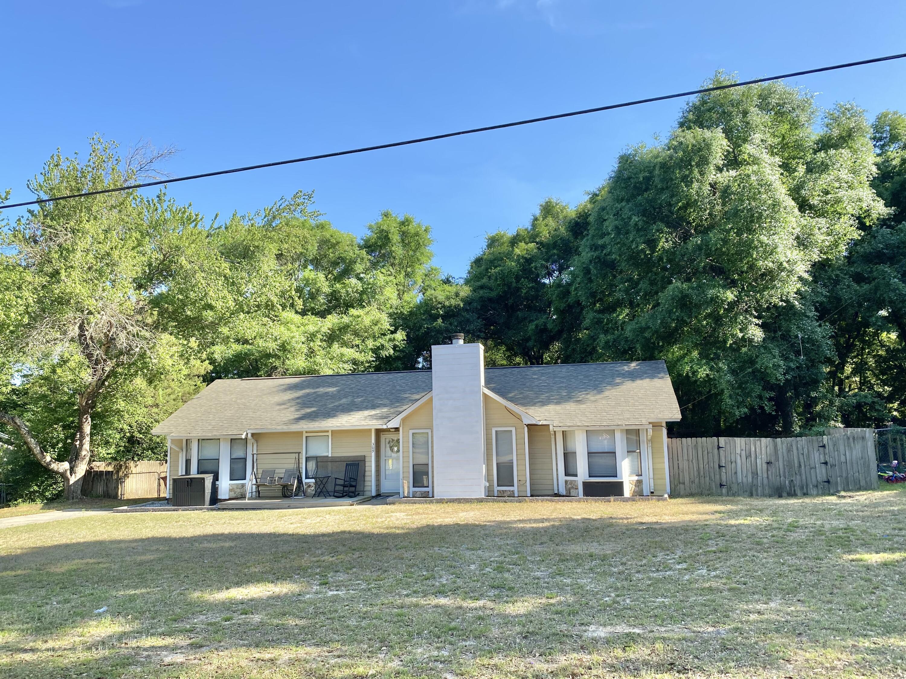 Cute 4B home with split floor plan. Adults   have your Privacy or mother- in- law suite. Central to Crestview and downtown yet take the back way down Hwy 90 to the new cut through to P.J. Adams and on to Southside to 85. This cuts all that traffic! 
The sellers have lovingly updated this home over the last couple years, and it shows! Luxury vinyl plank flooring, Chair rail, modernized fireplace, shiplap walls and other goodies make this home warm and inviting. 
Newer roof, AC, water heater makes this loan worthy and insurance friendly.
Outside front and backyard are spacious for kids and dogs to run and play. Neighborhood presents itself to families and a country living feel. Backyard privacy fenced in make it your own Oasis! Priced to sell don't wait schedule your own private showing today! Buyer and buyer's agent to verify all measurements and anything deemed important.