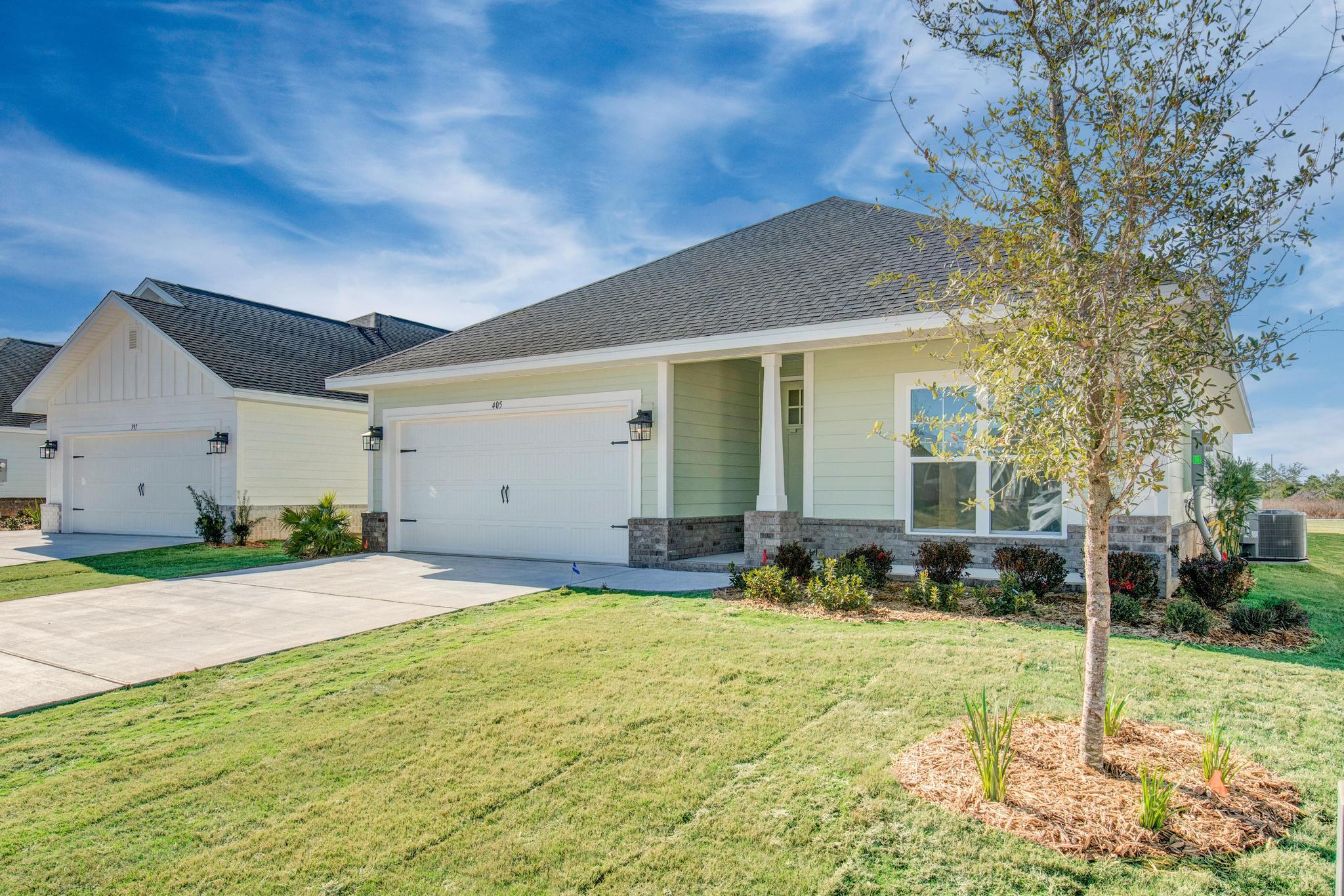 This popular Craftsman-style 3BR/2BA home (currently under construction: (Est. Aug/Sept completion) is ideally located in the back of the Community backed up to the woods. Designed with both comfort and style in mind, the home features HardieBoard® siding with a brick skirt, vaulted ceilings,  and CoreTec Pro Plus luxury vinyl plank flooring throughout--no carpet. The spacious primary suite boasts elegant tray ceilings, a generous walk-in closet, and a spa-inspired bath. Quartz countertops in the kitchen and baths, soft-close cabinetry, spacious covered patio complete this inviting home, perfect for relaxed everyday living and entertaining. Riverwalk residents enjoy a community pool, clubhouse, fitness center, scenic nature trail, and neighbor hood dock, offering plenty of opportunities to get outside and enjoy the Florida life style.  *Pics are of a similar home.*