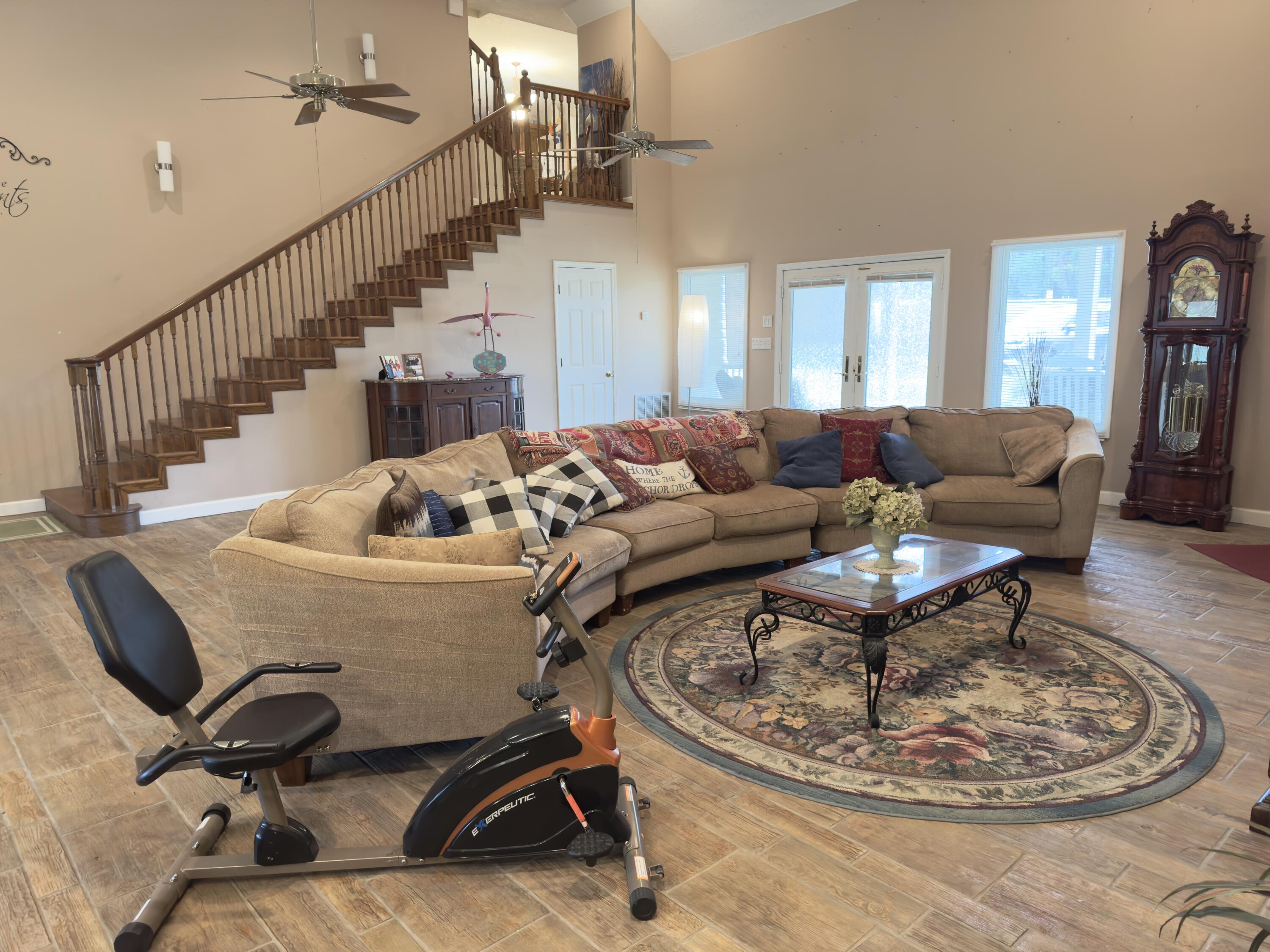 OW -- what an incredible property! Nearly 20 acres featuring a spacious home designed for gathering and entertaining, with an oversized great room and kitchenette perfect for holidays, family get-togethers, Bunco nights, youth groups, and hosting guests. If you're the one everyone naturally gathers around, this home was made for you! Outside you'll find an enclosed workshop wired and ready for power, plus an impressive 4-stall barn with water already in place. Toward the back of the property was once a large pond that washed out during Hurricane Michael and may offer restoration potential. A rare opportunity with space, flexibility, and endless possibilities!