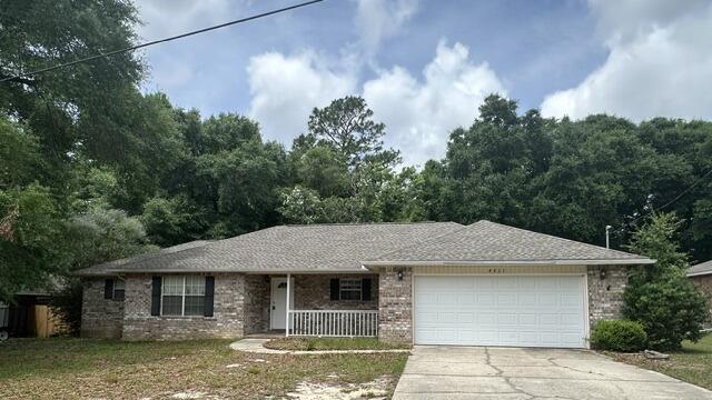 This all brick 3 bed, 2 bath home offers 1,705 sq ft on a quiet cul-de-sac just outside Crestview. Less than five minutes from I-10 and downtown, it blends country peace with city convenience.

Inside, cathedral ceilings and laminate wood floors create a spacious living room. The split floor plan ensures privacy, with a large primary suite featuring a tray ceiling, garden tub, dual vanities, shower, and walk-in closet. Tile floors in the kitchen, dining, baths, and laundry make upkeep easy.

Outside, enjoy a fenced backyard with no rear neighbors, an arbor-covered patio, and a storage building. The two-car garage includes an extra storage closet.
Step inside through the oversized foyer into a massive living room featuring soaring cathedral ceilings and upgraded laminate wood flooring. The kitchen and dining areas showcase elegant tile flooring, which also extends into the bathrooms and laundry room for easy maintenance.

The thoughtfully designed split floor plan provides added privacy, with the secondary bedrooms located on the opposite side of the home from the primary suite. The spacious primary bedroom features a tray ceiling and plenty of room for a sitting area. The en-suite bathroom includes dual vanities, a relaxing garden tub, separate shower, and an oversized walk-in closet.

Enjoy cooking and entertaining in the open kitchen that flows seamlessly into the dining area. Outside, the fenced backyard offers excellent privacy with no rear neighbors, plus an arbor-covere