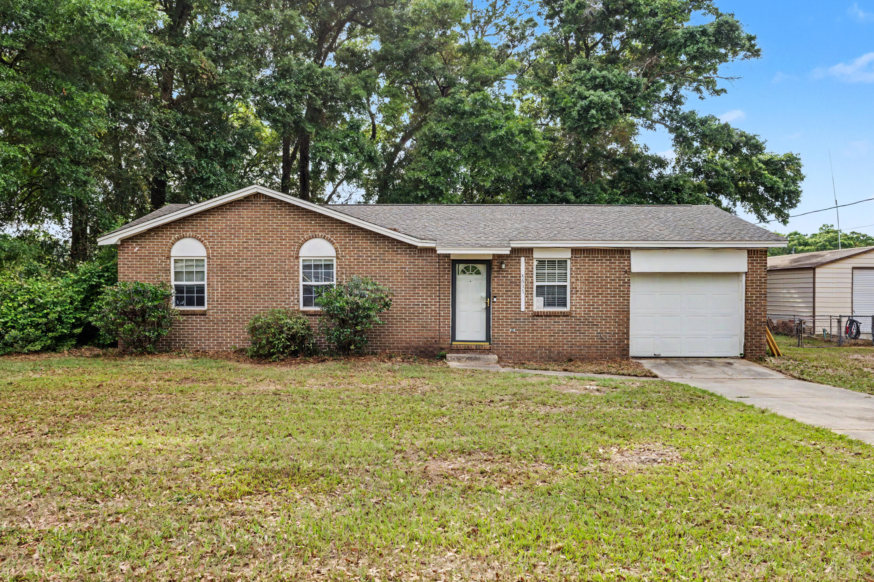 Charming 3-bedroom, 2 bath brick home offering 1040 sq ft of living space. Step outside to a spacious fenced in backyard with space for pets, entertaining and relaxing.  Great opportunity for a first time home buyer or investor.