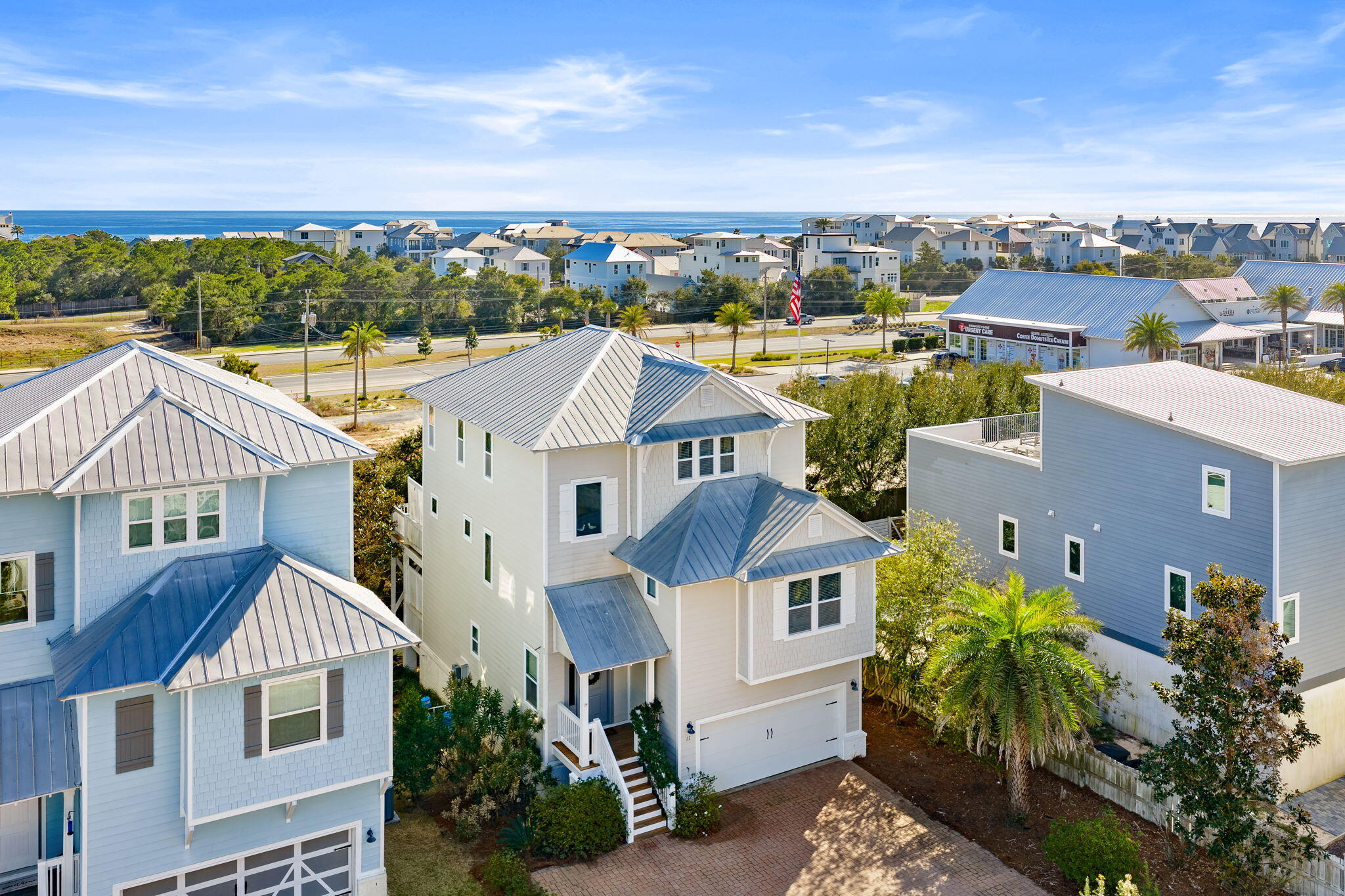 ** Open House 5/16/26 11am-2pm** Tucked away in the sought-after Inlet Heights community of Inlet Beach, this beautifully appointed 3-story, 4 bedroom coastal retreat offers the perfect blend of luxury, location, and lifestyle. Just a short distance from the sugar-white sands of the Gulf, this home is ideally positioned for enjoying everything along Scenic Highway 30A.

Designed for both relaxation and entertaining, the home features multiple levels of decks and a private fire pit area, perfect for gathering with friends and family after a day at the beach. From the third-story balcony, enjoy stunning water views of the Gulf, creating the ideal setting for morning coffee or sunset evenings. Inside, the thoughtfully designed layout offers hardwood floors throughout the main living areas, a spacious great room, and an open dining area that flows seamlessly for entertaining.

The first level includes two guest bedrooms and a laundry room, offering privacy and convenience for guests. The second floor features an additional bedroom and full bath, while the third floor is dedicated to an oversized primary suite complete with an office nook, his-and-her vanities, a large soaking tub, and a beautifully tiled walk-in shower.

Additional highlights include a 2-car garage, paver roads and driveways, and the home is being sold fully furnished, making it truly move-in or rental ready.

Residents of Inlet Heights enjoy exceptional amenities including a community pool, community room, and a dock overlooking Lake Powell. The location also allows for an easy walk or bike ride to 30Avenue, Rosemary Beach, and nearby public beach access, placing dining, shopping, and the beach all within reach.