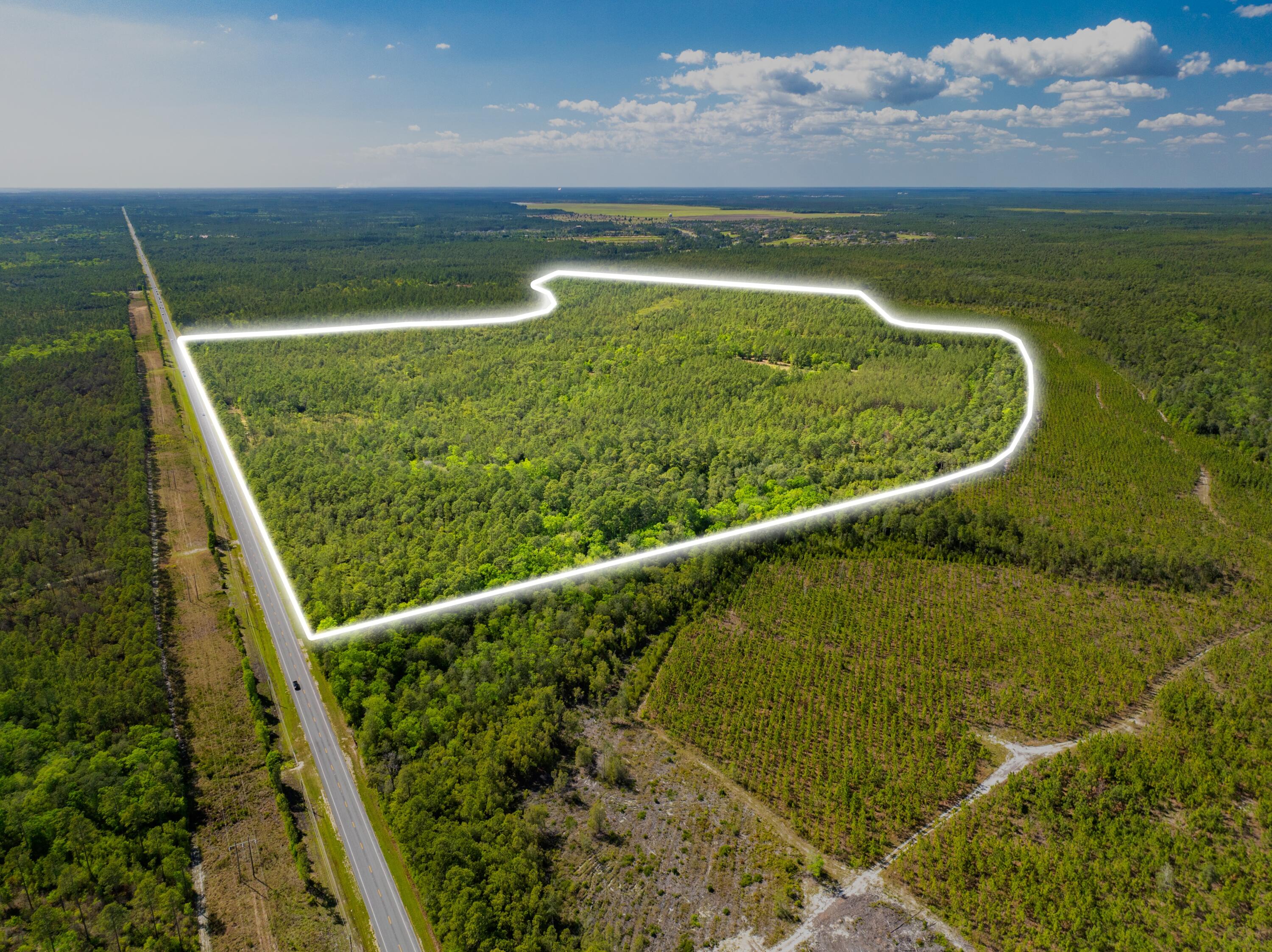 Positioned in the heart of Freeport, one of the fastest-growing communities in all of Florida, this expansive 222-acre parcel presents a rare and highly versatile investment opportunity in Walton County. Designated with a Future Land Use: Rural Residential and Zoning: Rural Village, the property offers exceptional flexibility for investors and developers alike. Whether envisioned as a large private estate, phased residential community, or a strategic subdivision and resale opportunity, the possibilities here are both diverse and scalable. The parcel is ideally located just 6 miles from U.S. Route 331, providing convenient access south to the world-renowned beaches of Scenic Highway 30A, which are only 20 minutes away. The property is also located just 20 minutes from Latitude ... Margaritaville and just under 30 minutes from the Panama City Beach Airport. The Airport is currently undergoing a large expansion, positioning it to become a principal port of entry into the area. The new Florida State University affiliate Hospital and Clinics, currently under construction, will also only be an easy 20 minutes drive. This prime positioning places future residents within easy reach of coastal amenities while enjoying the privacy and space of a rural setting. The parcel is the site of the proposed "Quail Run" residential development, envisioned to include approximately 400 homesites along with two 40,000-square-foot commercial buildings, creating a thoughtfully designed mixed-use community. Surrounded by the continued growth and demand driving Freeport and the greater Emerald Coast region, this property stands as a prime opportunity to capitalize on Northwest Florida's upward trajectory. With substantial acreage, favorable zoning, and subdivision plans already drawn up, this offering is well-positioned for immediate and long-term development success.

Contact the Listing Agent for Additional Property Information.