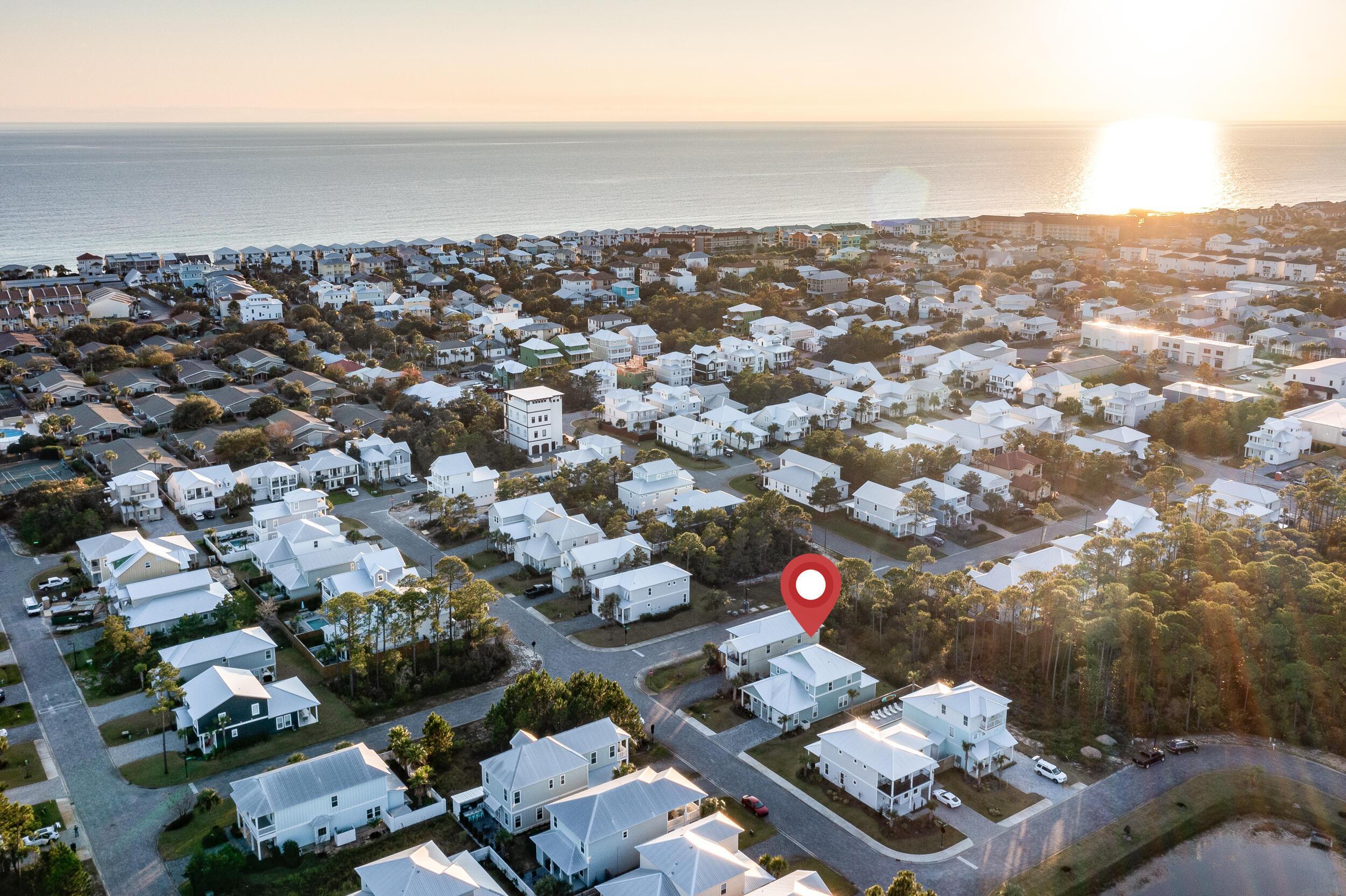 This upscale beach home in Frangista Beach is one of the few properties with a private backyard pool. Ideal for full time living or a high performing rental investment, this gated community includes a community pool and is just a short walk or golf cart ride to the beach and dining. Natural light fills this 4 bedroom, 4.5 bath home, designed for effortless entertaining. Each bedroom is a private suite with its own bath and walk-in closet. Features include 10' ceilings, upgraded wood vinyl flooring (no carpet), a large kitchen with soft close cabinetry, a massive granite island, smart home controls, oversized garage as a game room, custom blinds, and premium outdoor finishes. The backyard is perfect for entertaining guest or just taking a day at the pool. Home comes furnished. A must see Frangista Beach opportunity.