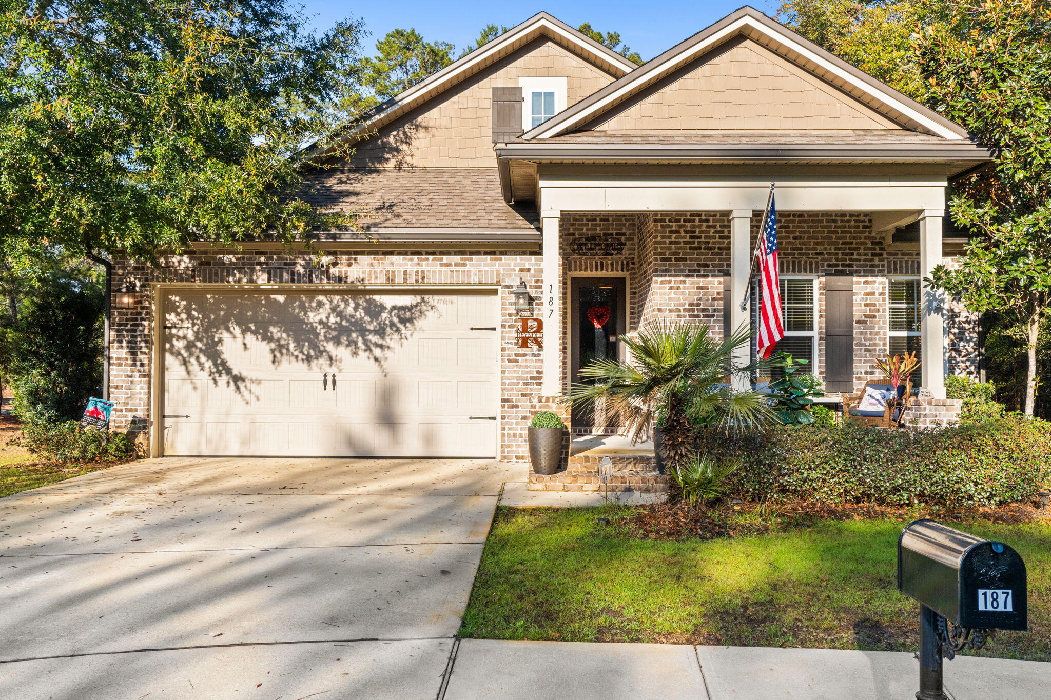 Take advantage of this great price reduction! Seller wants to move to be near family. PRIVATE LOCATION AT END OF CUL DE SAC and surrounded by wooded preserve. Built by Randy Wise -one-story open floor plan, combining living, dining and kitchen areas .. LVP flooring, gas range, oversized refrigerator, three bedrooms, FLEX room, spacious laundry room and tons of upgrades! The kitchen boasts granite countertops with seating at the center island. The enclosed lanai blurs the lines between indoor and outdoor living.  The well-organized garage with texture flooring and custom built-ins makes for a highly functional space that maximizes storage and efficiency, moving beyond just a place to park the cars. Enjoy the wonderful amenities of Hammock Bay - clubhouses, fitness centers, sports comple