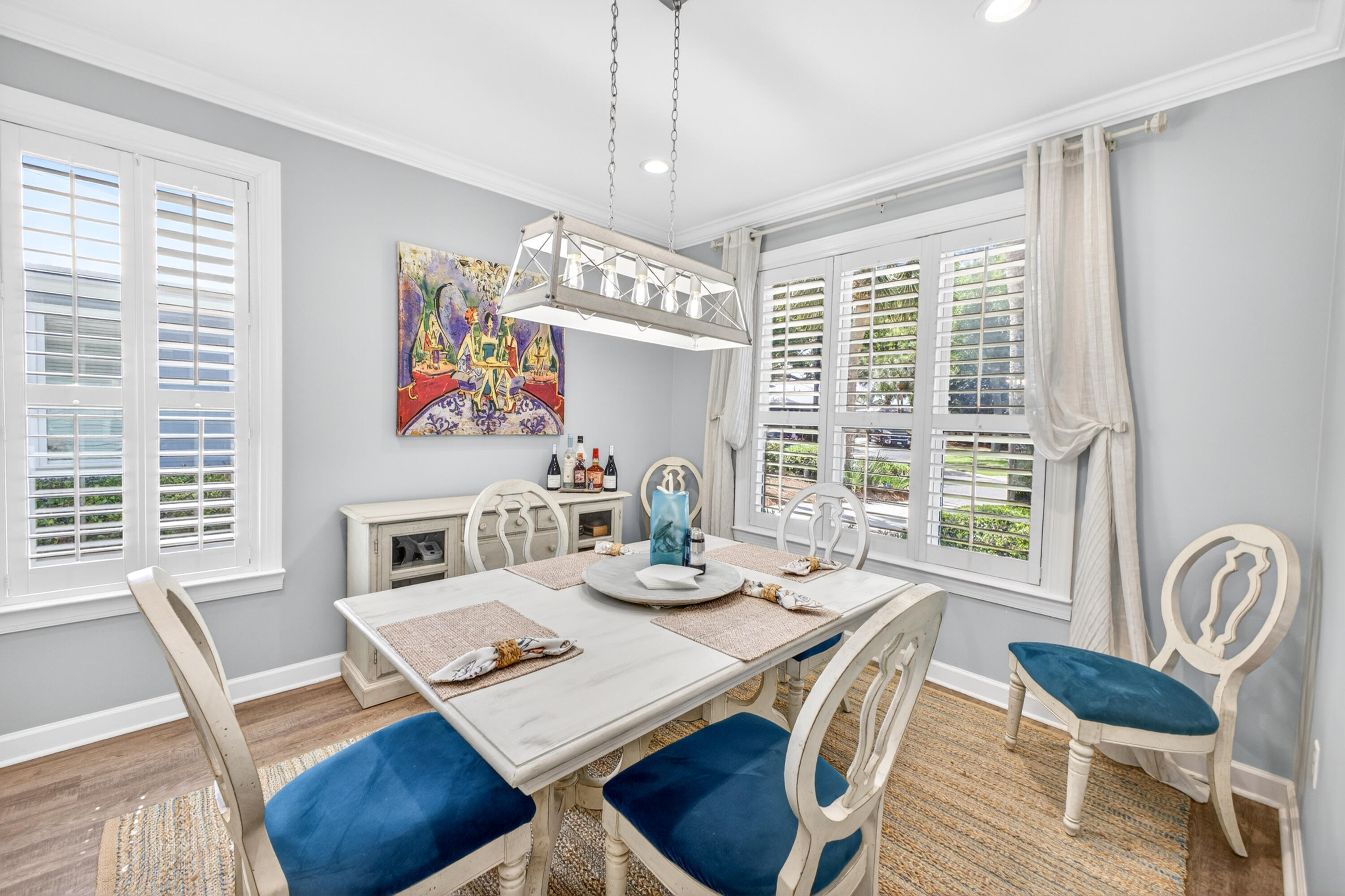 PRICE POSITIONED IN SANDESTIN! This iconic, single-level Florida Cottage in the coveted Crystal Lake neighborhood offers the ultimate resort lifestyle at an incredible new value. Embracing effortless coastal design, this beautifully bright 3-bedroom residence features an additional dedicated home office--perfect for the remote professional. The open living spaces are anchored by an expansive, 23-foot enclosed Florida Room designed for year-round entertaining. The private master suite boasts dual vanities and walk-in comfort, while hobbyists will love the detached garage featuring an exclusive, fully air-conditioned workshop space and dedicated golf cart parking. Located on a quiet cul-de-sac just a quick golf cart cruise from the Marina, Baytowne Wharf, pristine beaches, and world-class golf. A rare combination of single-story peace of mind and luxury resort amenities!