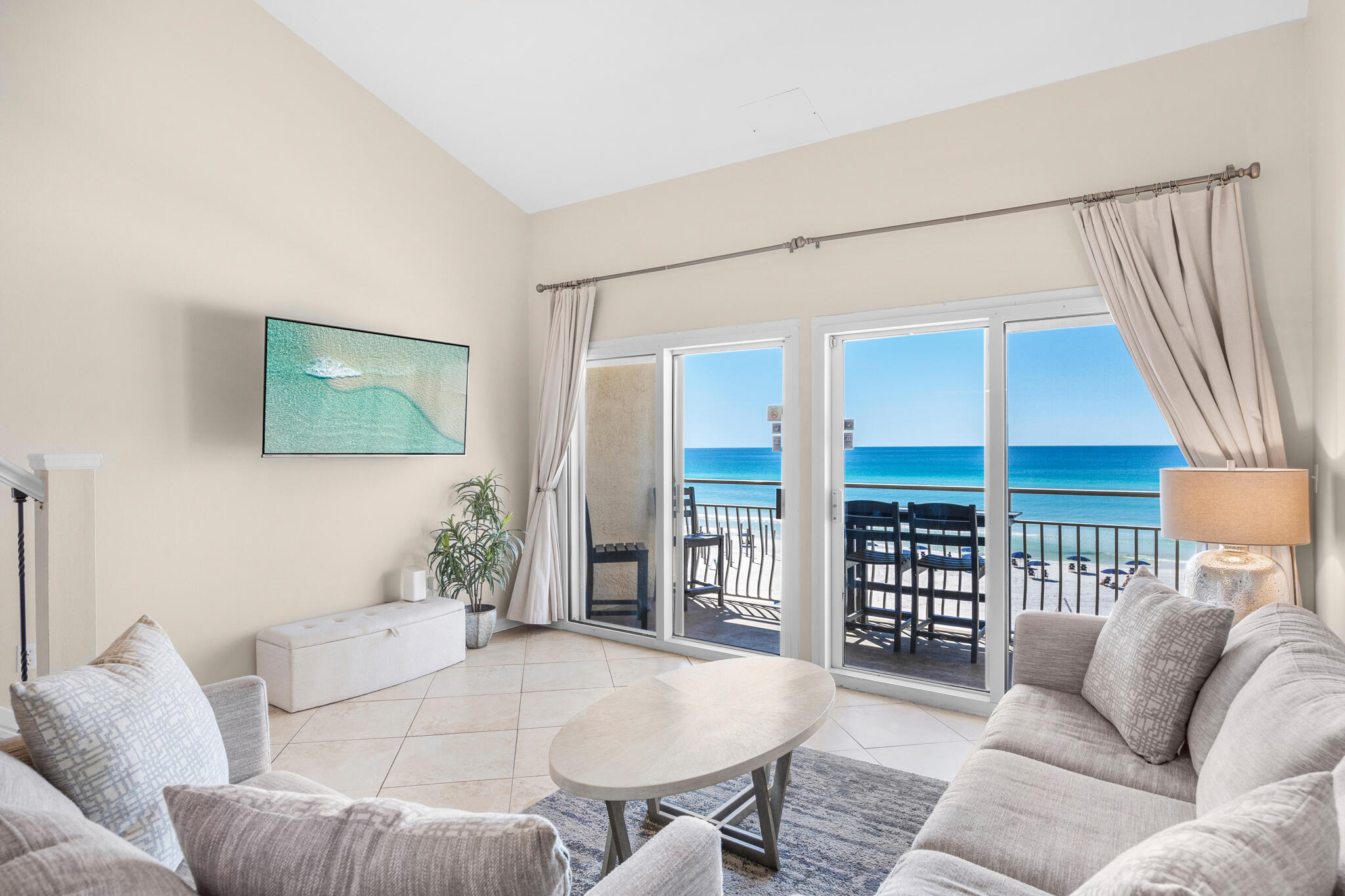 Welcome to Crystal Sands, a low-density Gulf-front development in the heart of Crystal Beach, Destin. This beautifully updated 2-bedroom, 2-bath condo in the West building is a prime rental investment, generating $81-$85k annually. Featuring vaulted ceilings, breathtaking Gulf views, and luxury vinyl & tile flooring, this spacious unit includes a lofted bonus room and sleeper sofa, accommodating up to 8 guests. The kitchen boasts updated countertops, new stainless steel appliances, and sleek cabinetry, while the fully furnished interior showcases fresh coastal décor & flat-screen TVs. Enjoy stunning sunsets & Gulf breezes from the private balcony, with panoramic views from the kitchen, dining, and upper level. Fully furnished turn-key investment in a prime location near many conveniences! The primary suite on the main level includes a king bed and ensuite bath, plus a stackable washer & dryer behind a charming barn door. Upstairs, a second king bedroom with barn doors offers stunning Gulf views, accompanied by a full bath and a bonus room with twin beds. Throughout the unit, updated lighting and fans complement upscale furniture, creating a modern yet relaxed ambiance in this low-density complex. The soaring vaulted ceilings enhance the spacious, open feel.

Crystal Sands offers two pools (one heated seasonally), gated beach access, a beachside grilling area, and on-site beach service with rentals for umbrellas, chairs, kayaks, and paddleboards. Ideally located along Scenic 98, you're minutes from Henderson Beach State Park, Destin Commons, Whole Foods, and HarborWalk Village. Walk or bike to local favorites Camille's and Soleil, or take a charter cruise or fishing trip from the nearby HarborWalk marina. Don't miss this turnkey, high-ROI opportunity. Start living the Crystal Beach lifestyle today!