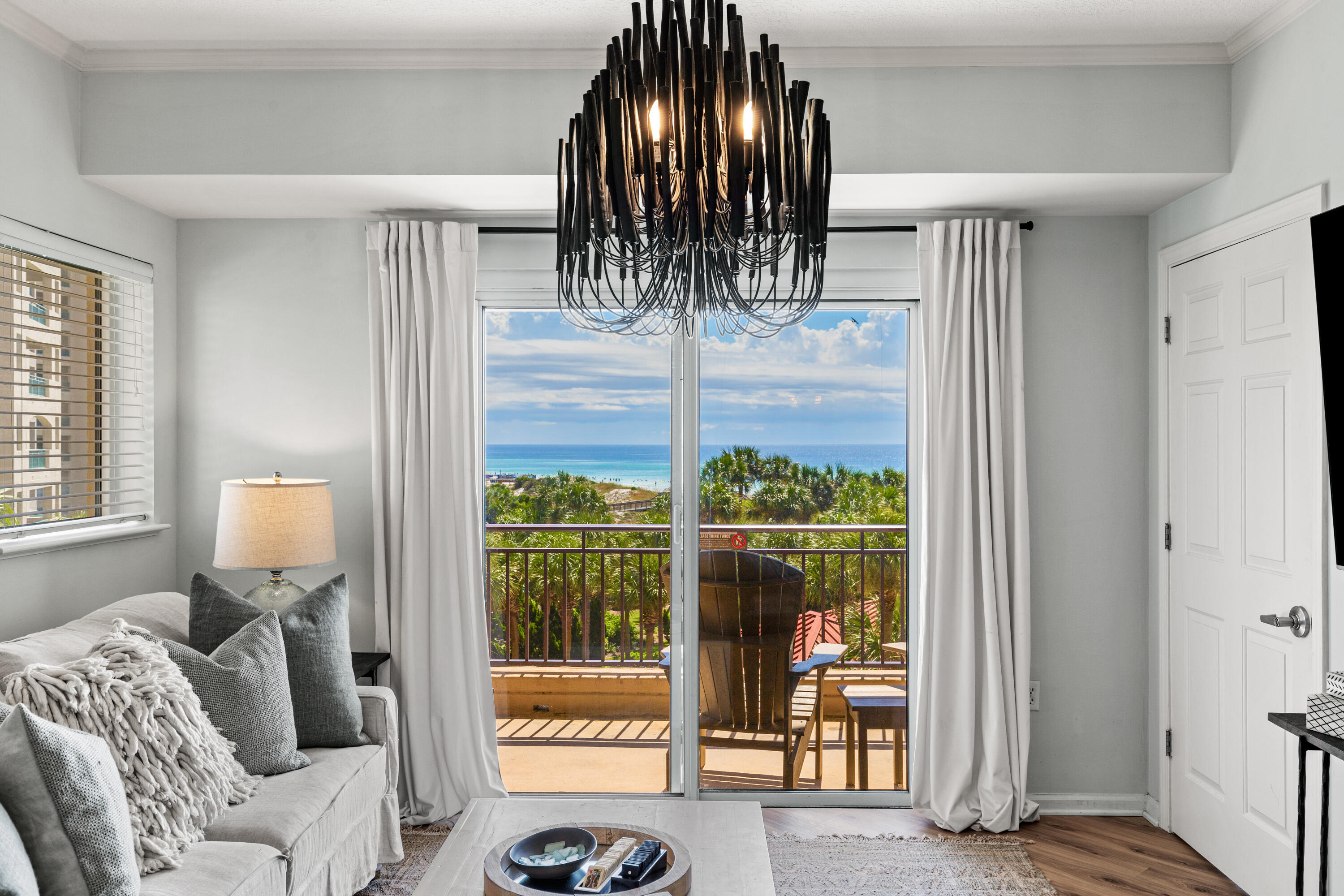 Smart money chases the highest return, NOT the highest view.  GENERATING 30% MORE INCOME THAN OTHER UNITS WITH $81,508 ACTUAL 2024 RENTAL INCOME, ENJOY IMMEDIATE CASH FLOW!   Own a property that works for you from day one.  Ideally located on the 3rd Floor, enjoy the convenience of skipping elevators & stepping right into your beach getaway.  Its beautiful, professionally decorated interior is designed for comfort & functionality. Blending luxury living w/PROVEN rental performance, this fantastic condo offers you the Coastal lifestyle you've dreamed of.  Start your day w/a walk on the beach, work out at the fitness center & then head out for a pickle ball match just moments away.  Unwind w/a sunset cocktail on your private balcony overlooking the turquoise waves, and cap it off w/dinner at Baytowne Wharf.   A palette of coastal pale blues that perfectly compliment your Gulf vistas beyond, you'll be captivated by the thoughtful renovations w/LVP flooring throughout, and a beautiful, white kitchen w/quartz counters, large eating bar & NEW SS appliances.   A distinctive, tiled backsplash elevates the space.  The master suite, in calming shades of blue, provides a tranquil setting and Gulf views from its private balcony.  An elegant white, wood trimmed wall accents the spacious, 2nd bedroom.

Whether a primary residence, 2nd beach home or short-term rental property, begin enjoying your coastal retreat IMMEDIATELY, as the turn-key professional interior design extends throughout every room creating cohesive, luxurious spaces. In addition to the caged storage area in the underground parking lot, this unit also has a 2ND STORAGE UNIT located in the hall near the front door.

Located within the renowned Sandestin Resort, the private beach, Gulf side pool, kiddie pool, spa and fitness center are a short walk or golf cart ride away. Gulf enthusiasts will appreciate the proximity to world-class courses, while tennis & pickle ball players can perfect their game on courts nearby.  

The legendary Baytowne Wharf, with its charming attractions, restaurants & special events lies just a short golf cart ride away.  This pedestrian-friendly village creates a sense of community while offering entertainment options for all ages, from family-friendly festivals to sophisticated evening dining experiences. 

Publix super market at Grand Boulevard ensures that grocery shopping remains effortless, while Grand Boulevard's fantastic restaurants & boutique shops offer endless opportunities for dining and retail therapy. 

Providing peace of mind to owners regarding structural integrity & safety standards, Westwinds has successfully passed the milestone & SIRS inspections and recently replaced all 4 elevators.  In addition, the complex maintains strong reserves for any future projects.

This exquisite property embodies a lifestyle choice that prioritizes both luxury and financial prudence. Its combination of: ideal 3rd floor location w/elevated Gulf & foliage views without the long elevator wait, stunning interior, 4-seat golf cart WITH dedicated golf cart parking spot, PROVEN 30% HIGHER RENTAL HISTORY THAN OTHER UNITS, and access to world class amenities provides the perfect foundation for your coastal dreams.

Enjoy the Sandestin coastal lifestyle at its finest--vibrant, effortless & unforgettable.