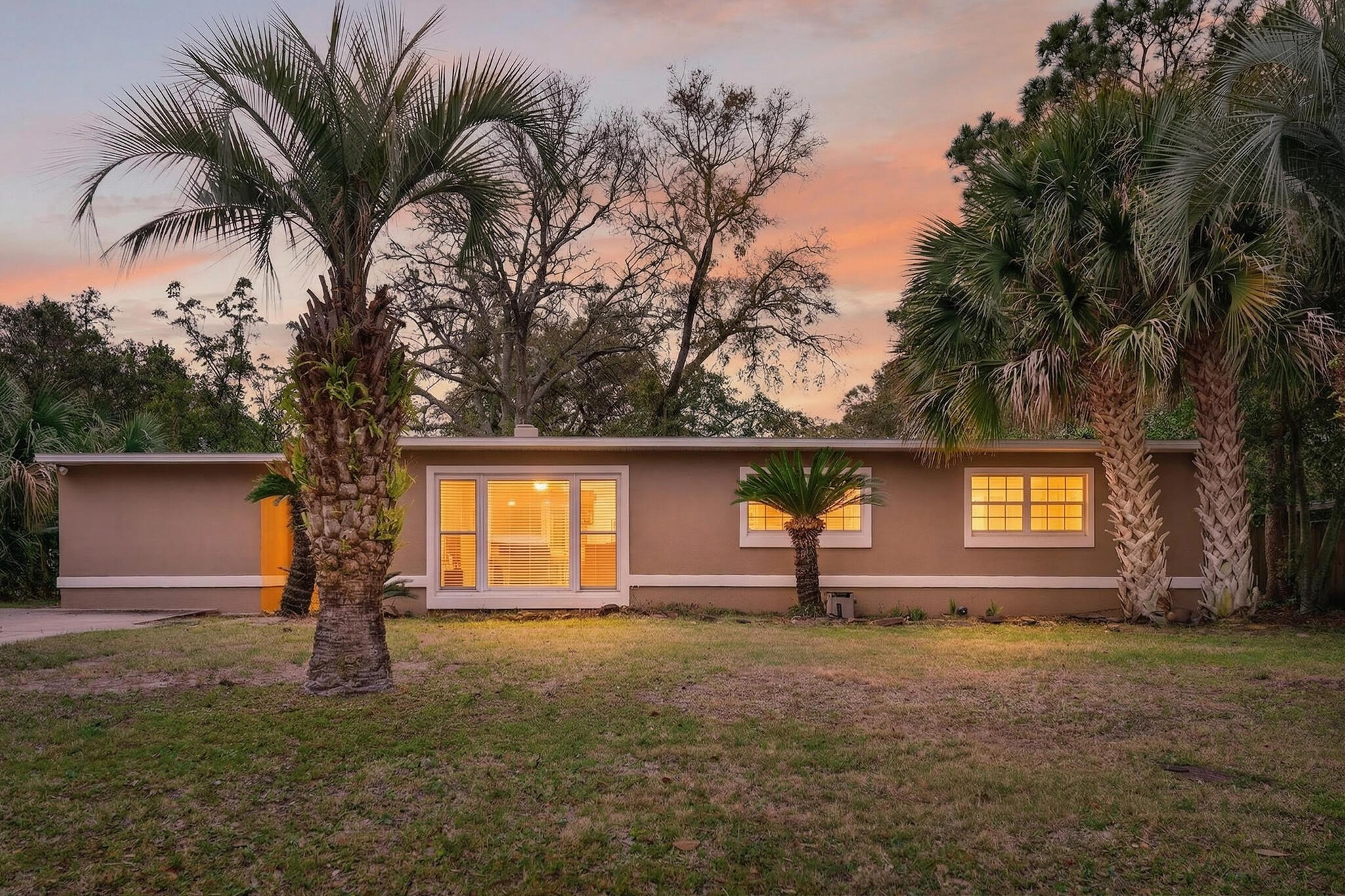 Welcome to this comfortable and inviting 4-bedroom, 2-bathroom home offering 1,865 square feet of well-designed living space, located just half a mile from Ferry Park and close to military bases, beaches, shopping, and restaurants.
As you walk in, you're welcomed into a front living room that flows easily into a secondary living space/family room where the fireplace is located. The fireplace features a mahogany surround and creates a cozy, relaxed area that's perfect for everyday living or gathering with friends and family.
The kitchen opens to the dining area, making it easy to stay connected whether you're cooking or entertaining. It offers granite countertops, some new stainless steel appliances, and plenty of cabinet space for storage. The layout provides a split-bedroom design, with the primary suite located on one side of the home for added privacy, while the remaining bedrooms and main bathroom are situated on the opposite side.
The primary bedroom includes two closets, giving you extra storage space. The additional bedrooms are well-sized and flexible for guests, kids, or even a home office.
Step outside to a spacious backyard that offers plenty of room to add a pool if desired. There's already a designated horseshoe area, making it a great setup for entertaining or enjoying time outdoors. A covered patio provides a comfortable place to relax, and the storage shed adds extra functionality.
Major updates include copper wiring, new flooring in 2025, and a roof replacement in 2025, giving peace of mind for the next owner.
This home offers a great combination of space, layout, and location--making it a solid opportunity in the Fort Walton Beach area.