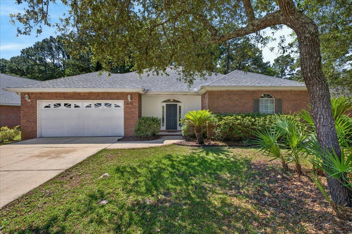 Welcome to the peaceful Indian Woods subdivision of Destin. Single level, custom built, brick home offers low-maintenance living. The interior features a spacious open floor plan with vaulted ceilings that span the living and dining areas. Beautiful backyard with privacy behind the home. For added peace of mind, the home was upgraded with a new roof in 2022 and HVAC in 2020. Close proximity to beaches, restaurants, schools, and shopping.