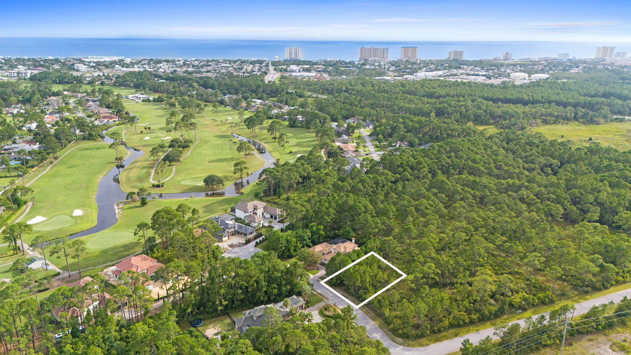 $5,000 TOWARDS CLEARING! Discover the perfect opportunity to build your dream home on this .3-acre lot in the highly sought after Trieste gated community. Approx. 1.8 miles from the beautiful sand and emerald waters of the Gulf, this prime location offers a blend of luxury, convenience and exclusivity. Enjoy a serene lifestyle with access to hiking trails, golf courses, and a host of other amazing Coastal amenities. Don't miss out on this rare chance to own a piece of paradise in Trieste!