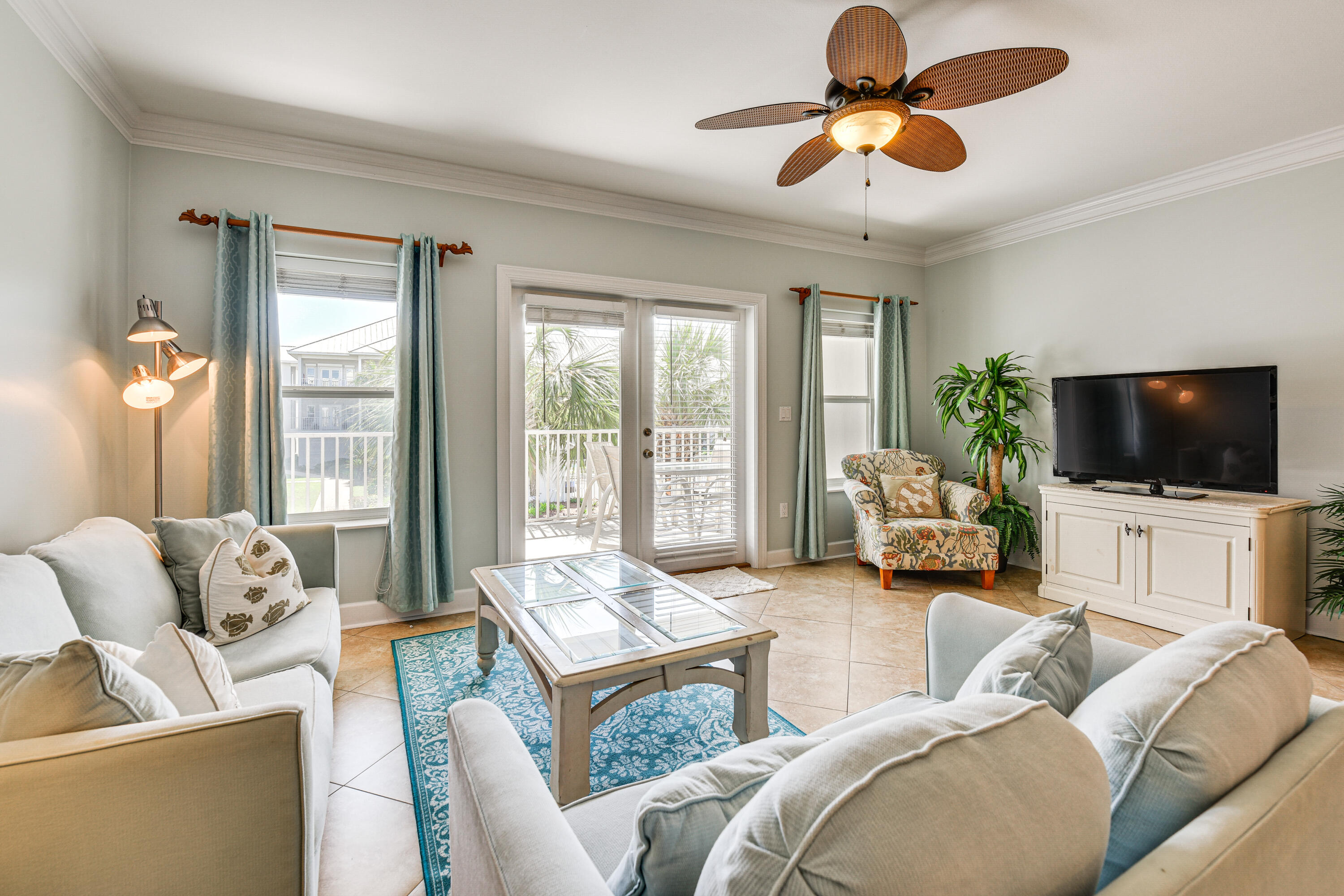 This beautifully maintained 2-bedroom, 2-bath condo is sold fully furnished, making it completely move-in or rental-ready. Inside, you'll enjoy a spacious open layout and a large private balcony perfect for entertaining or relaxing. Just steps from a public beach access with a restaurant and restrooms, this location combines privacy with unbeatable convenience. The condo includes a RARE 2-CAR GARAGE--perfect for vehicles, beach gear, or a golf cart for cruising along Scenic Gulf Drive. Plus, there's an additional exterior storage closet, ideal for keeping all your beach essentials neatly tucked away. Pavilion Palms features a sparkling community pool and beautifully landscaped grounds, all within a secure, gated environment.  Awesome investment or primary residence in Miramar Beach!