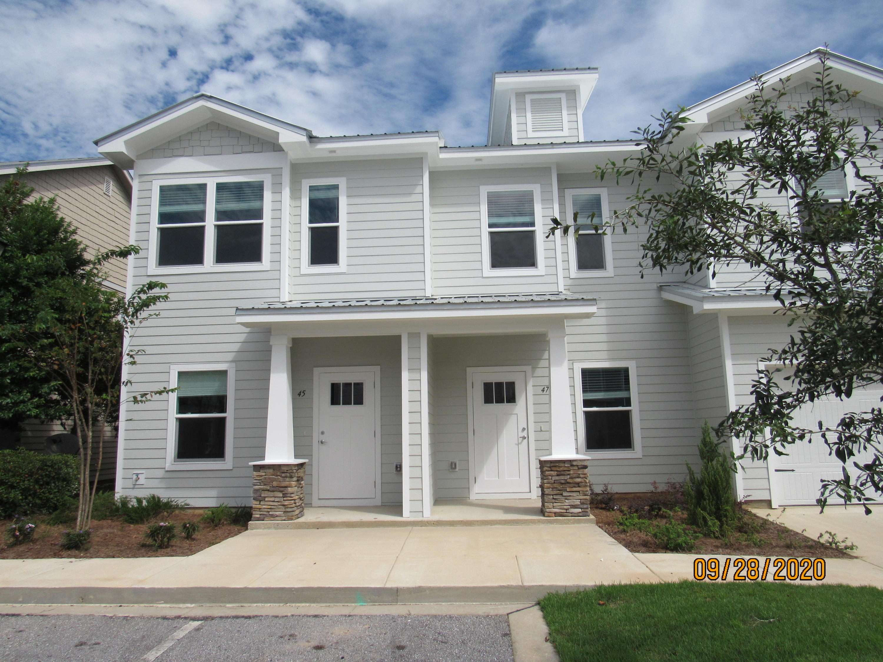This beautifully upgraded end-unit townhome, built in 2020, offers 3 bedrooms and 2.5 baths and is perfectly designed for modern living. Ideally located directly across from an elementary school and just minutes from a Publix shopping center, the home provides everyday convenience along with an easy commute to the sugar-white sand beaches and emerald waters of 30A/South Walton.

Inside, you'll find a clean and contemporary feel with neutral paint throughout and a completely carpet-free interior. The open-concept first floor features a spacious living area with a cozy nook, flowing seamlessly into the eat-in kitchen. The kitchen is both stylish and functional, showcasing beautiful countertops, a breakfast bar, ample cabinet space, stainless steel appliances, a flat cooktop stove,  and a designer backsplash that ties it all together. A half guest bath with a pedestal sink and a screened-in back porch complete the main level, offering both comfort and convenience.

Upstairs, the primary suite includes a walk-in closet and a private en suite bathroom. Two additional guest bedrooms share a full bathroom and are located near the laundry area, which comes equipped with a washer and dryer. The home also offers generous storage space throughout.

Residents can enjoy access to the community pool, with pool care, lawn maintenance, and garbage services all included in the rent. Pets may be considered on a case-by-case basis with owner approval and a non-refundable pet fee. Please note that smoking, including vaping, is not permitted in the home.