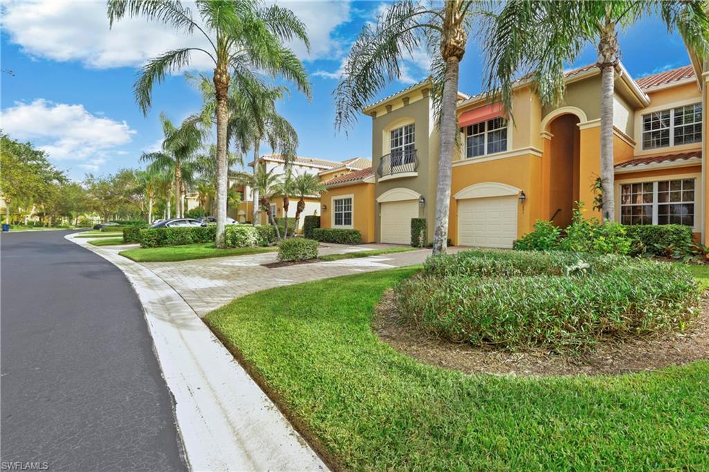 Indulge in the ultimate golf course lifestyle with this exceptional coach home. Vasari is a bundled golf community with a Pro Shop.  Situated with a picturesque southern exposure, this second-floor retreat offers breathtaking views of the lush golf course from the spacious screened lanai. This 3-bedroom den, 2-bathroom coach home boasts nearly 2,200 sq ft. A grand wooden staircase with beautiful iron railing welcomes you, setting the tone for the home's exquisite design. The owner's suite is a true sanctuary, featuring generous his and her walk-in closets, and a spa-inspired bathroom with dual vanities. The split floor design ensures optimum privacy for guests and family members. The custom kitchen features cabinetry with soft-closing drawers, Bosch dishwasher, and Whirlpool Gold Series stainless steel appliances. Enhancing the charm of the home is elegant plantation shutters throughout. Spacious under-stairs storage is a bonus for keeping your home organized. Amenities: 18-hole golf course, aqua range, putting green, fine dining, lighted tennis courts, fitness center, meeting/game rooms, bocce courts, and enjoy the pool, spa, and the nearby bar & grill offerings. (NO ASSESSMENTS)
