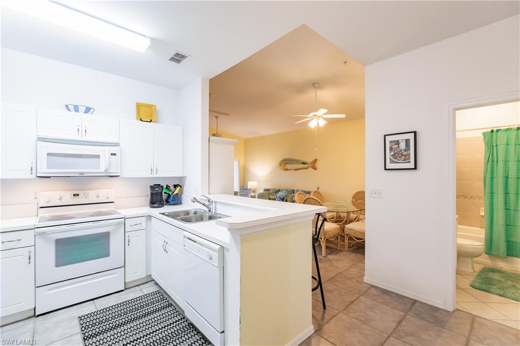 MOVE RIGHT IN! Enjoy the Florida lifestyle right away, just bring your bags! This 3 bedroom, 2 bath condo has plenty of space for year round residents, or those just looking to spend more time in sunny Florida.  The kitchen opens to the living and dining room area, with 2 guest bedrooms on one end, and a full bathroom.  The spacious master bedroom has a walk in closet and full bathroom.  The home contains a new AC unit, washer and dryer, tile floors, and much more! The community of Bellamar boasts a swimming pool and spa, clubhouse, and exercise room.  Bellamar is located 10 minutes from Sanibel, 10 minutes from Ft. Myers Beach, and just minutes to many restaurants and shops! Come enjoy all Florida has to offer!