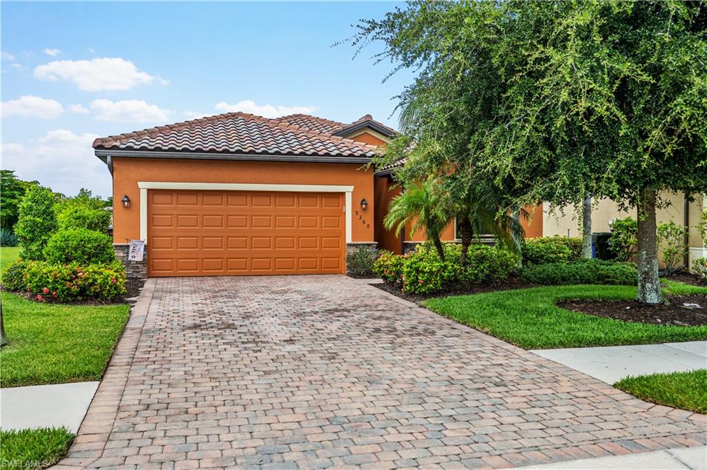 ABSOLUTELY GORGEOUS! Call today to schedule your private showing of this 2012-built home with 4 bedrooms, 3 baths, over 2000 sq ft under air & attached OVERSIZED 2 car garage! Once you arrive, you'll be greeted by stone accents, pavered drive & walkways and beveled glass door with transom window. Inside, you'll be impressed by the diagonal tile & crown molding throughout the main living areas. A great room layout you'll be amazed at how spacious your new home feels! Kitchen boasts an abundance of wood cabinetry, granite, pantry, island w/ breakfast bar & stainless appliances. Wood plank wall accents in the dining & living areas provide both a homey and designer feel! Master suite is well appointed with wood plank tile, crown molding, soaking tub, double sinks, plus separate water closet & shower! Three additional bedrooms also feature plank tile with one offering built ins - perfect for home office/game/playroom! Perhaps most of all you'll truly appreciate the fully fenced yard (ideal for kids/pets/or just simply privacy) that encloses your screen enclosed pool & spa with large under truss area perfect for entertaining! So many incredible features! At this price, it's time to MOVE!