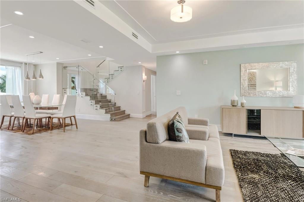 *Entire building is under contract in Commercial MLS. Regarded as the pinnacle in luxury living, this spacious 4 bed / 4 bath penthouse residence is mere steps away from 5th Ave S and world renowned beaches. Sprawling over 3700 sq ft, this luxurious two story residence offers two master suites, conveniently located on each floor, with private balconies and spa inspired bathrooms. The first floor features a chef's kitchen with marble countertops, Wolf and SubZero appliances, and overlooks the adjacent dining and living room. Fashion forward, glass-railing staircase leads to the second floor of the home, or take the convenient private elevator.  Entertaining awaits on the second floor with a TV/game room, private balcony and wet bar, complete with a wine cooler and 3 bedrooms and bathrooms. Enjoy the outdoor tropical oasis pool and spa shared only by the four residences. Outstanding finishes and superb living in the heart of Olde Naples; a short stroll from the vibrant shopping and dining of 5th Avenue, Cambier Park, beaches, and the iconic Naples Pier. All 4 residences are for sale-could be purchased as a family compound or corporate retreat.