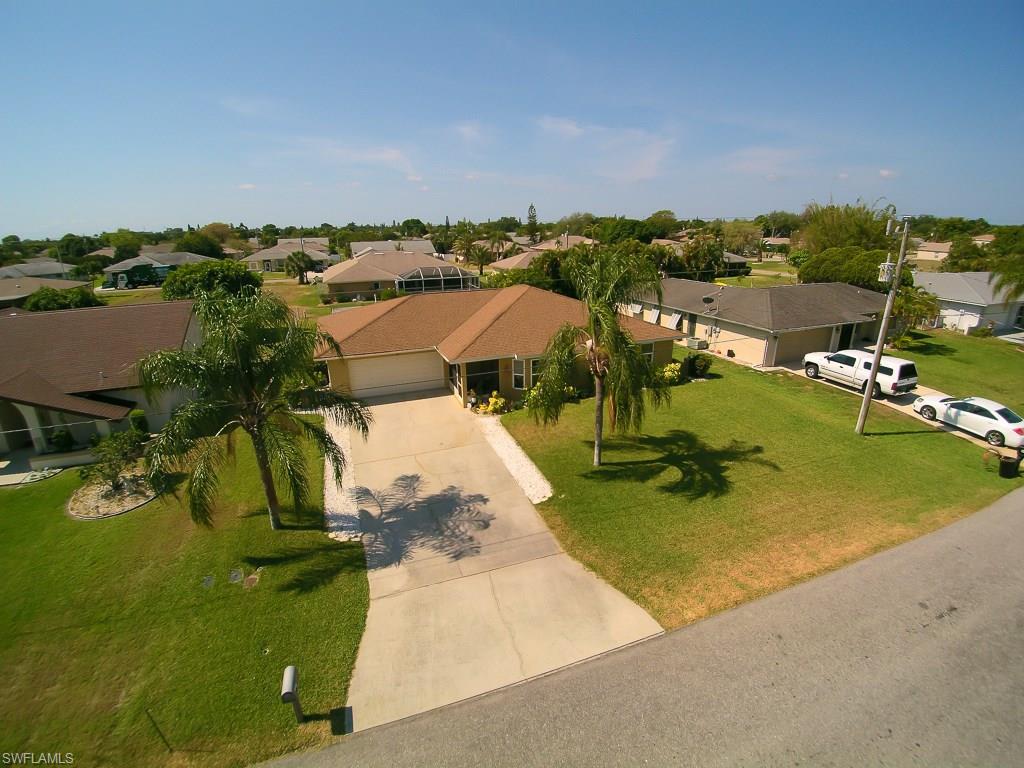 Are you looking for a home that has it all?  Then look no further!  This newly renovated home will satisfy the SW Florida living that you desire.  Close to everything that Cape Coral has to offer like shopping, restaurants, downtown Cape Coral, the yacht club, bridges to Fort Myers, and so much more!  With ALL the assessments paid in FULL, this home has very low taxes compared to the cold, snowy north.  Too many upgrades to list, so book your appointment to see this home in person!  Come experience all that Cape Coral has to offer and it starts with the purchase of this home!
