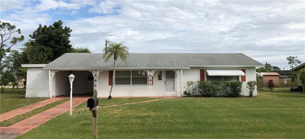 WOW!  My phone has been ringing off the hook!  NOW THE OWNER JUST INFORMED ME, HE IS GOING TO INSTALL A BRAND NEW CENTRAL A/C SYSTEM IN THE HOME (as the previous A/C is no longer functioning properly). If you were on the fence, make up your mind quickly because this will be under contract VERY SOON!  Nice quaint home with tons of natural light and a large completely fenced back yard?  Located in the sought after community of Wedgewood, this property is ideally located in Lehigh Acres, close to everything, including grocery stores, gas stations, restaurants, and specialty shops.  This home is set up perfectly for a family, couple or single person, with two large bedrooms a large family room, dining room, kitchen, a master bathroom and a full guest bathroom with tub and shower.  This home also has a bonus, enclosed "Florida Room" with its own air conditioning (The rest of the home has central air conditioning and heating)  There is tons of storage throughout the house, including the "built-in" cabinets in the large laundry room and attached workshop.  This home is priced to sell quickly, so please set up your showing today and make you or your buyer a very happy customer.  :0)