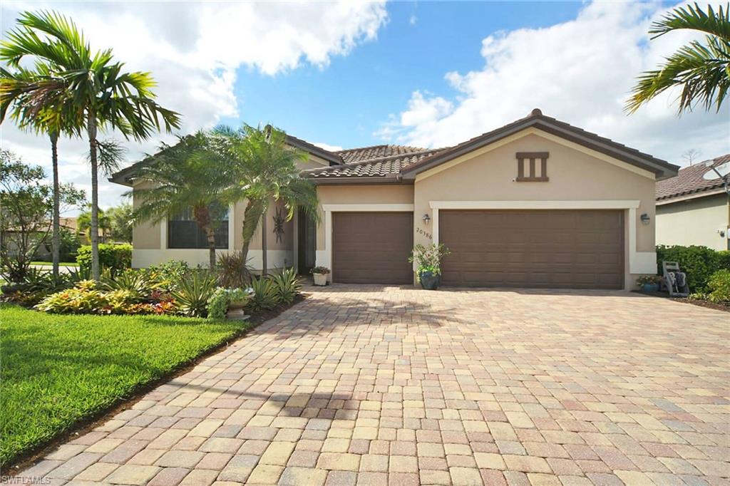 One of the premier gated developments in Estero with easy access to shopping, I 75 & the airport. This bright and open (see virtual tour) with tons of upgrades 4 bedroom 3 bath with rare 3 car garage, open great room concept & huge 18 x 40 foot extended lanai/patio with large 6 person hot tub and plenty of room to add a pool. accent lighting, landscaping, great for BBQ and entertaining family & friends. Larger corner lot so room for the kids to play. Many custom upgrades, new appliances & bosch dishwasher, white painted cabinets throughout the house, crown moldings, under cabinet lighting, tiled backsplash, new hardware, seamless shower doors, custom lighting, new interior paint with custom wood accent walls and shelves. The Preserve at Corkscrew has a resort style pool & spa, beautiful community center with fitness area, yoga studio, lighted tennis & pickle ball courts along with street lights and sidewalks throughout the development.