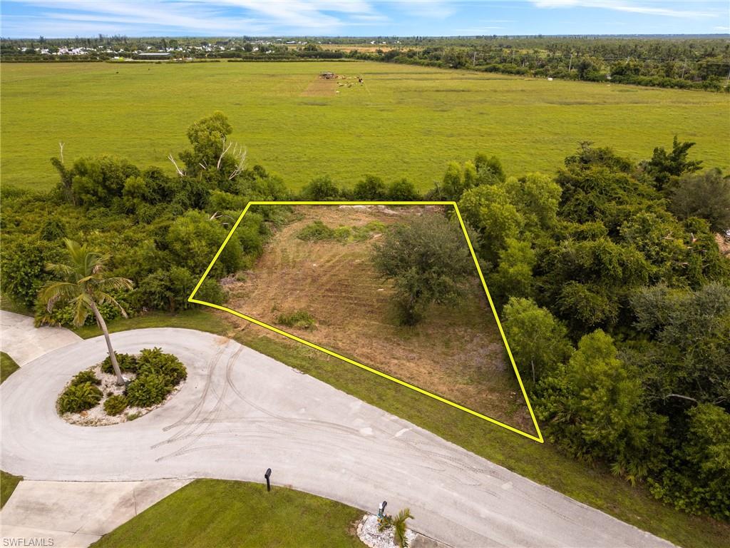 Build Your Dream Home in Pine Island Village – .25 Acre Homesite

Discover the perfect setting for your future home in Pine Island Village, a quiet and quaint community in Saint James City. This .25-acre homesite offers both charm and convenience, with paved, county-maintained roads and water and electric hookups available at the street.

Residents of Pine Island Village enjoy neighborhood amenities including a half basketball court and a lovely community pool, creating a relaxing and welcoming atmosphere. With very low HOA fees of just $300 per year, you’ll appreciate the affordability and value of this community.

For your peace of mind and planning ease, a boundary survey and architectural plans are already available. This property is an ideal opportunity to build in a tranquil location while still being close to all that Pine Island has to offer—fishing, boating, dining, and small-town coastal living.