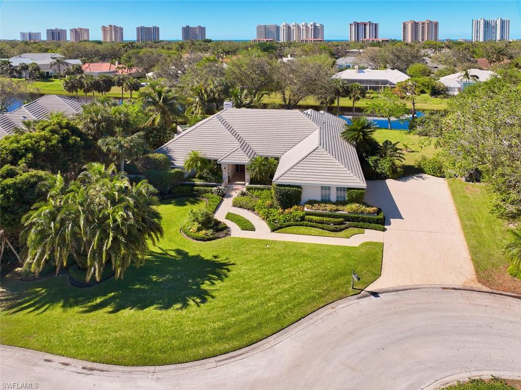 Over 160ft of waterfront property on Oakmont Lake! This spectacular lakefront western exposure homesite on a quiet cul-de-sac in Pelican Bay features well over 1/2 acre (.54 ac), serene water views, abundant privacy, and mature landscaping. At an elevation of 16.1’, the 3,326-square-foot, single-story residence offers fantastic renovation potential. 4 BR, 3.5 BA, 3-car garage pool home with minimum 9'10" ceilings throughout, large windows, and concrete-block construction, all perfectly sited on one of the most beautiful waterfront lots in Pelican Bay. There’s plenty of room to add more bedrooms, a game room, a gym, or an attached casita. Renovate or build the new home of your dreams. New construction concept available upon request. The residence sustained no Hurricane Ian damage. Ideally located a short distance to Artis Naples, Waterside Shoppes, Publix. Pelican Bay is the hottest location in Naples, offering private access to 3 miles of beach, gulf-side dining, kayaking, sailing, an active tennis program, and much more, all surrounded by 88 acres of parks and recreation areas. This home is the best value currently available in Pelican Bay, and a must-see for the discerning buyer