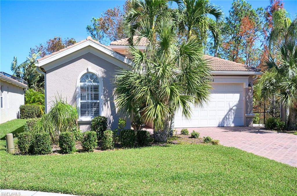 Highly sought-after North Naples Location!  Close to shops and restaurants and 15 minutes to beautiful beaches.  Enter through the security gate and relish the alluring grounds and the breathtaking landscaping of this exclusive 100-acre, amenity-rich residential community.  With a split bedroom floor plan, an open great room with a 12’ ceiling, and a dining area featuring tile flooring set on the diagonal, tray ceilings, and crown molding --there is plenty of room to entertain your family and friends.  Enjoy the updated kitchen with granite counters, newer appliances, and a charming breakfast nook that overlooks the private backyard and the peaceful wildlife Preserve.  Step outside into your screened lanai to enjoy the fig tree’s fruit and an Avacado tree.  Your private membership to the exclusive Club At Sterling Oaks includes a Fitness Center, Dining Room, an indoor lounge, Cabana Bar, a Pool & Spa, 12 Har-Tru Green Clay tennis courts, Bocce Ball, Pickleball, Playground, and more!  If you are looking for what the SWFL Lifestyle is all about, you just found it here!