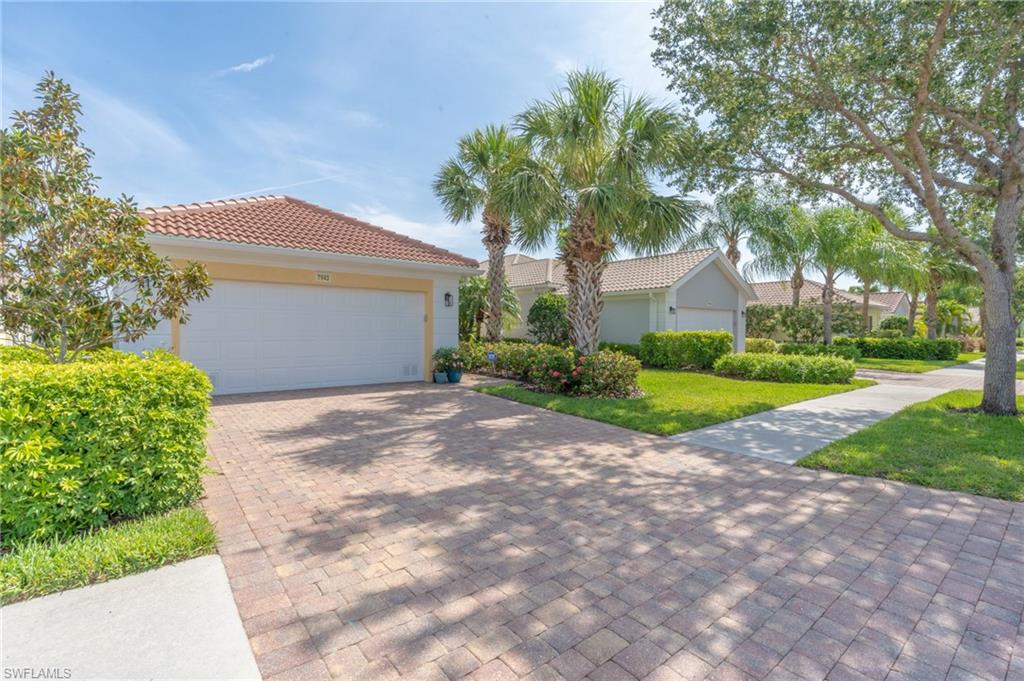 Newly listed is this welcoming, partially furnished, three bedrooms with den/two bath Oakmont single family home located in the gated community of VeronaWalk.  A glass entry door accesses a tiled open living space with extra tall ceilings. A den to the right of the door makes for a private home office or study.  The adjoining living space is anchored by a massive wall unit offering storage, as well as a place to display treasures.  A centrally located, white kitchen has been equipped with stainless appliances including a French door refrigerator. The long breakfast bar, great for a quick snack, adds to the adjacent dining space.
 The split bedroom floor plan has the main suite off the living room.  A lengthy hall  to the ensuite bath is lined on both sides by closets.  The ample bath can be utilized by two at the same time with a soaker tub, dual entry shower, two toilets and two vanities. 
This home had a new roof recently installed, New A/C and completely freshly painted inside and out.
A long bank of rear sliding doors with an additional slider in the main suite allows for access to a covered lanai and large patio surrounding a screen enclosed, rectangular shaped pool overlooking a restful waterway.