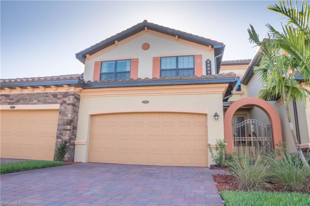 Don't Wait! This beautiful almost new coach home won't be on the market for long! This upstairs  unit includes 3 bedrooms, 2 full baths. Master bedroom has 2 walk-in closets. Great Room is perfect for entertaining your guests. Beautiful kitchen with maple cabinets & granite counter tops. Step outside onto your lanai and enjoy the golf course and lake views. Unit also has a 3 car garage. Located within a gated lifestyle amenity rich community. Enjoy lunch at the outdoor restaurant overlooking the magnificent pool.