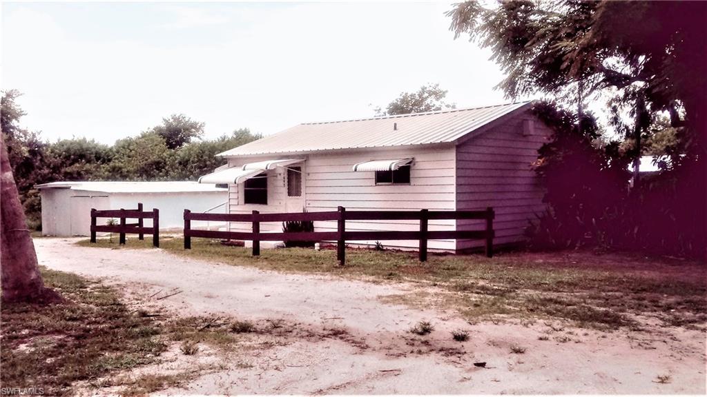 LAKEPORT 2BD/1.5BATH Cottage, SHOP & GARAGE with Power, Water & large enough to park a bass boat. Laundry hook-up inside.  Metal Roof. Septic installed 2013+/-.  New Laminate.