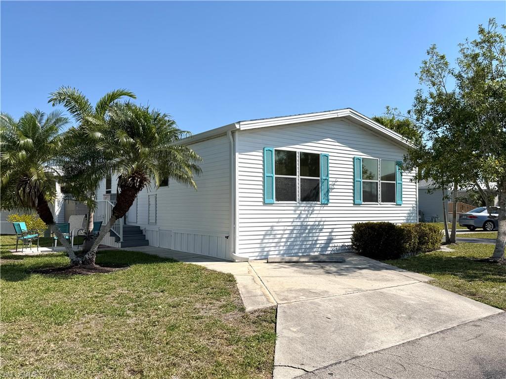 Discover Your Dream Home in Riverwoods Plantation - A Premier 55+ Mobile Home Community in Estero, FL!

Welcome to this incredible 1999 Home of Merritt mobile home, nestled on an oversized corner lot with a partial lake view in the desirable Riverwoods Plantation. This spacious two-bedroom, one-and-a-half-bath residence offers a unique blend of comfort and lifestyle in an active adult community.

Step inside to find a desirable layout featuring new appliances and laminate flooring in the living room and kitchen, new roof in 2023. With ample storage, including a large utility room, this home is perfect for those looking to downsize without sacrificing space.

Riverwoods Plantation offers a vibrant community feel, where you not only own the land you live on but also enjoy an array of exceptional amenities. With an on-site property manager and activity director, you will never run out of fun things to do! Engage in a variety of recreational activities such as sand and water volleyball, pickleball, tennis, bocce, horseshoes, and shuffleboard. Enjoy special events, exercise classes, water aerobics, and live music from talented bands right in your community!

For the creatively inclined, there are quilting and craft classes, along with fun social activities like line dancing and card games. Residents also appreciate the community breakfasts and engaging guest speakers. 

One of the standout features of Riverwoods Plantation is its unique riverfront property, allowing residents to store water toys such as boats, kayaks, and canoes. The convenient boat ramp provides direct access to the Estero River, leading to the beautiful Estero Bay and the Gulf of Mexico.

Conveniently located near the airport, shopping centers, stunning beaches, and restaurants, this home is perfect for those seeking an active lifestyle in a peaceful and welcoming environment. Don’t miss this amazing opportunity to call Riverwoods Plantation your home!