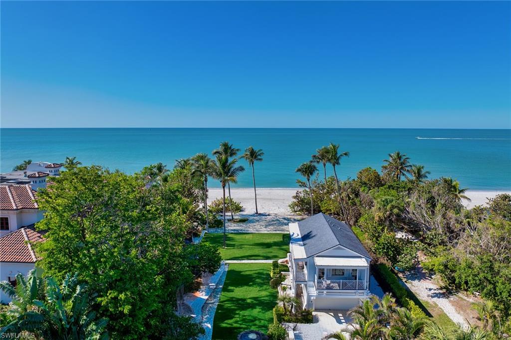 Once-in-a-lifetime opportunity to own a piece of paradise in one of the most sought-after coastal communities in the world. Quietly tucked along Gulf Shore Boulevard South arrives a generational opportunity boasting unparalleled views of the Gulf of Mexico and nearly one acre of sugary white sands and lushly landscaped grounds. This iconic piece of Old Naples beachfront is merely steps from the world-renowned Naples Pier, downtown 5th Avenue and 3rd Street South, where one can enjoy the finest shopping, dining and entertainment Naples has to offer. Over 102 feet of luxurious beach/gulf frontage offers picturesque and panoramic sunsets all year long. A newer construction in 2017 guest cottage with four-car garage adds further charm and versatility to the property. Embrace the freedom to design and build your ideal oasis, tailored to all unique tastes and preferences. Whether you envision a contemporary masterpiece or a bespoke coastal retreat, this opportunity provides the ideal foundation in one of Naples most desired locations. Easy and direct access to Naples Airport. Act now and make the dream a reality on this exceptional piece of Naples history. 102x395x102x395.