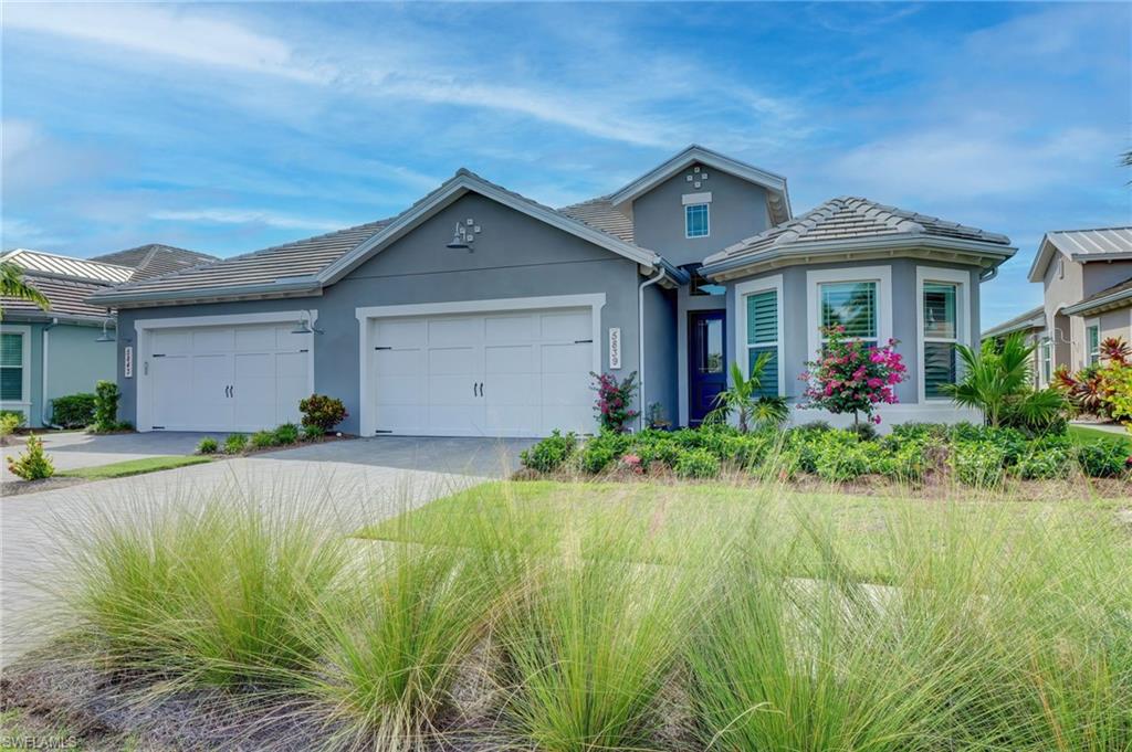 V12185 Absolutely fabulous “Fresia” home with numerous upgrades & tasteful fixtures with some furniture to match. This 3 bed, 2 bath plus den model is highly sought after within the safe & welcoming gated Isles of Collier Preserve. Meticulously maintained, well-designed throughout featuring bright white, soft close cabinets, plantation shutters, high tray ceilings with custom crown molding, shiplap decorative wall in the living room, upgraded floors, paint, built in closet shelves, & whole house water filter.  Enjoy sunsets relaxing in the pool & spa, through panoramic screened lanai overlooking a pretty lake surrounded by lush landscaping.  The Isles is amenity rich, with low HOA fees,  offering resort style living with modern fitness center, tennis, pickle ball, bocce, large community pool & lap pool, kayaking, catch & release fishing, water front dining restaurant, 8 miles of hiking and biking paths, as well as canine cove dog park for exercising and socializing. Virtually next door to US Open Pickle Ball Park, Botanical Gardens, Bayview Park & many fun restaurants including Celebration Park. Minutes to downtown Naples, beautiful beaches & the wide array of shops & dining.
