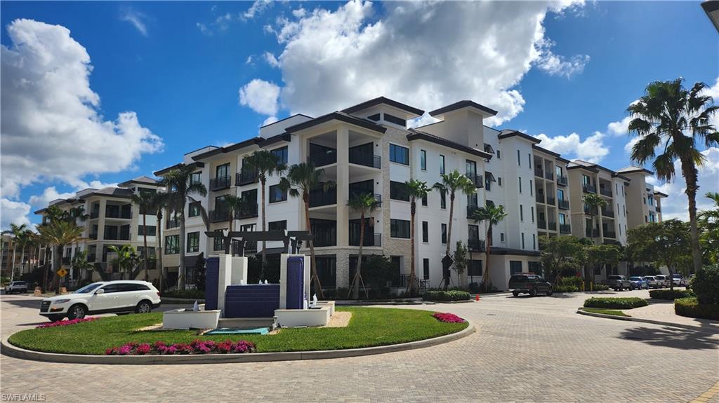 1 UNIT REMAINS! Brand New residence located in downtown Naples on 3rd Avenue South!  Walkable downtown area, wood floors throughout, and Seasonal Concierge Services.  Residence finishes include Sub Zero, Wolf and Miele kitchen appliances, Electrolux Steam washer and dryer, Irpinia cabinetry, Dornbracht plumbing fixtures, Frankie & Kohler sinks, Jacuzzi Stella free standing soaking tub and a beautiful light wood flooring throughout. Enjoy natural gas for cooking with upgraded Silestone quartz kitchen countertops. Residence includes two secure parking spaces and one storage space in the building’s gated, covered, first level garage. Building amenities include: Club Room, Fitness Center, beautifully landscaped Amenities Deck with a spacious pool, hot tub, trellised seating areas, shade cabanas, fire pit with seating, gas grilling area, and a covered bar with large screen TVs. Quattro at Naples Square consists of only 64 Residences.  Owners will enjoy seasonal in-house concierge and breakfast held in the community club room. All this and the energy of downtown Naples, just outside your door.