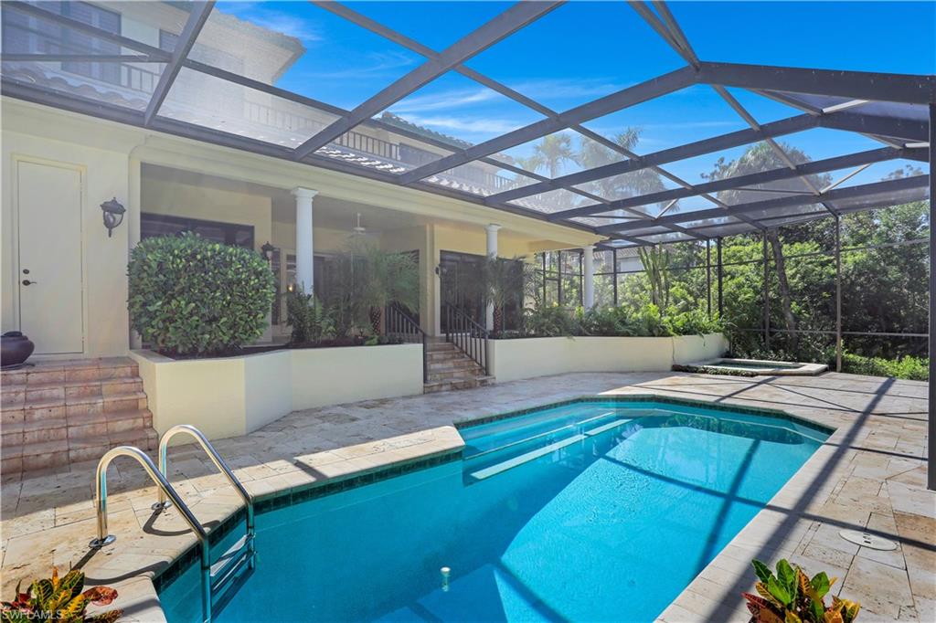 V.3046 - Live a luxury laid-back lifestyle with private beach access and attended cruise-like service on the sand or dine in a fabulous member-only Beach Club and Restaurant while you watch the sunset. The safe, picturesque dog-friendly neighborhood of Vizcaya is set within the exclusive Gated enclave of Bay Colony directly on the Gulf. This wonderful 4900 sq. foot, 2-story waterfront Majorca Villa (New Roof - 2018) offers a captivating southern view of Upper Clam Bay from the privacy of your own deck. Relax on your 38 foot covered Lanai surrounded by lush landscaping as you step down into a generously sized Pool and separate soothing Spa all screened for an enviable level of seclusion and security. The second floor balcony off the vast Owner’s wing provides another level of the nature preserve’s wondrous viewing. This is truly an amazing opportunity to own a spacious 5 Bedroom + Family Room + Study + Loft Office home. Bay Colony is located within SWFL's most desired beachfront community, Pelican Bay. The Waterside Shops & Artis-Naples border its south and the Ritz Carlton the north and it boasts two additional private beach restaurants, tennis centers and 2+ miles of coastline.