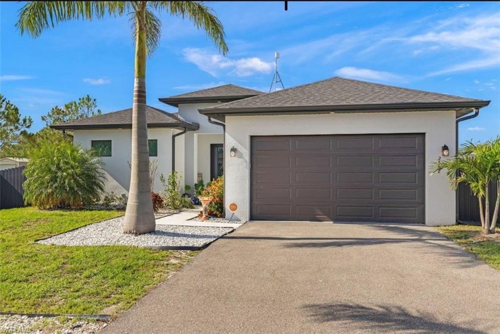 Welcome to your private Florida retreat in Golden Gate Estates. Built in 2022 and situated on 1.14 fully fenced acres, this beautifully maintained 3-bedroom, 2-bath residence offers the perfect blend of modern comfort, outdoor living, and peaceful surroundings.

Inside, you'll find an open-concept floor plan with soaring tray ceilings, tile flooring throughout, abundant natural light, and a spacious kitchen designed for both everyday living and entertaining. The primary suite provides a relaxing escape with generous space and thoughtful finishes, while a dedicated laundry room, whole-home reverse osmosis water system, and attached two-car garage add convenience and functionality.

Step outside and experience the true highlight of the property—a resort-style backyard featuring a heated saltwater pool, expansive paver deck, and covered lanai, creating the ideal setting for year-round entertaining or quiet evenings under the stars. Mature tropical landscaping enhances the home's curb appeal while preserving the tranquil atmosphere.

Offering the privacy and freedom of estate living with no HOA, yet just minutes from shopping, dining, schools, and the continued growth of Northeast Naples, this exceptional property is a rare opportunity to enjoy newer construction, generous outdoor space, and the Florida lifestyle you've been searching for.