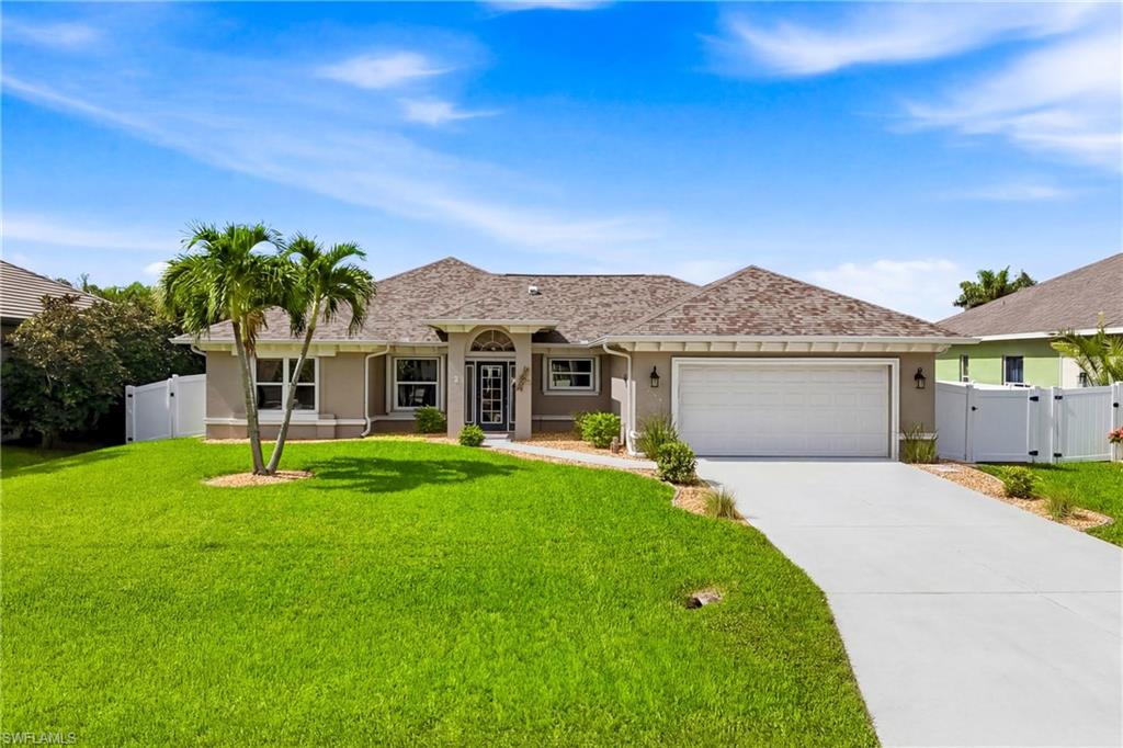 Rare 4-bedroom, 3-full-bath home in the highly desirable SW Cape Coral Surfside Corridor! This well-maintained home features an extended south-facing lanai perfect for grilling, entertaining, or relaxing outdoors. Inside you'll find fresh paint, updated lighting, refreshed bathrooms with new vanities, countertops, and glass, plus a spacious kitchen with abundant storage and solid surface countertops.
The private owner's suite offers a large walk-in closet, dual sinks, a jetted soaking tub, and separate shower. Additional highlights include impact windows and hurricane shutters, city water and sewer, a new A/C air handler (2026), roof, soffits, and gutters (2023), water heater (2019), and a GenerLink whole-house generator hookup. The home remained high and dry during recent hurricanes.
Conveniently located minutes from Cape Coral Charter Schools, Oasis High School, parks, shopping, dining, and beautiful Gulf access neighborhoods, this home offers an exceptional combination of space, updates, and location.
Qualified buyers may have the opportunity to assume the seller's existing VA loan at an attractive 3.25% interest rate, subject to lender approval and VA loan assumption requirements.