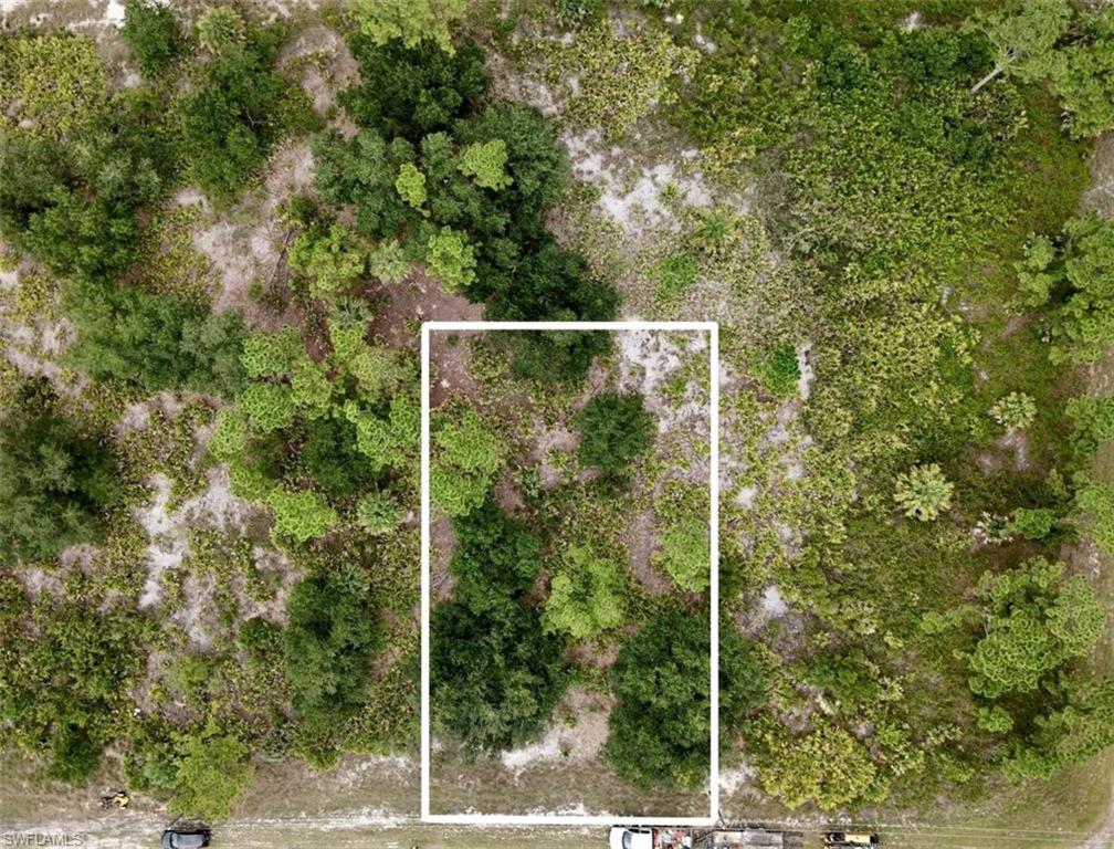 Build your dream home on this 0.26-acre residential lot located on Benjamin Ln in the growing city of North Port, FL. Situated in a peaceful neighborhood with convenient access to shopping, dining, schools, parks, golf courses, and beautiful Gulf Coast beaches, this property offers an excellent opportunity for a primary residence, seasonal home, or investment. Enjoy easy access to US-41, I-75, and nearby amenities while still appreciating the privacy of this desirable location. Utilities: Public water is not available in this area; a private well is typically required. Public sewer is not available; a private septic system will be required. Buyer should verify all utility availability, zoning, environmental conditions, and building requirements with the City of North Port and the appropriate utility providers.