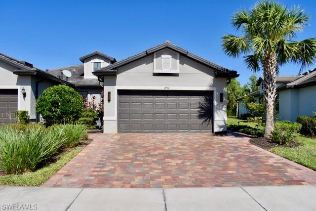 Winding Cypress 2 bed+den villa with POOL & SPA. This Serenity floor plan with the kitchen conveniently tucked away behind peninsula island allows for optimal entertaining space. Kitchen features Quartz countertops, natural gas range & SS appliances. Other highlights include, plantation shutters, crown molding, Lutron shades at slider, recessed & under cabinet lighting, upgraded lighted mirrors in both baths, laundry room cabinets & sink, privacy door for guest suite, pull down attic stairs in garage, widen driveway, pest control piping in the walls, newly installed storm smart electric screens on lanai and landscaped lighting around lanai. Slight pie shape lot and lush landscaping offers extra privacy for lanai and pool area. Located in sought after Winding Cypress Community with it's rich amenities including a resort style pool, restaurant/bar, fire pit, fitness center, outdoor yoga deck, pickle-ball, tennis, bocce ball, community garden, dog park, and a nature trail boardwalk that wanders through protected natural preserves. Centrally located between Marco Island and 5th Ave allows easy access to the surrounding areas beautiful beaches, restaurants and entertainment.