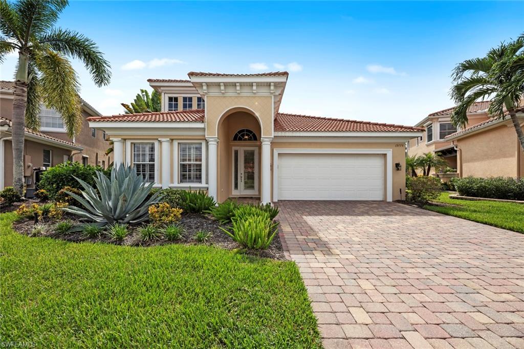 This impressive Toll Brothers "Marena" model is the best value you'll find in the sought-after Belle Lago community! This well maintained and move-in ready POOL home provides nearly 2,800 sf. of living with 3 bedrooms (FIRST FLOOR MASTER SUITE), private den, spacious loft, and 2.5 baths. Comfortable yet elegant, the living space is spread across two levels with volume ceilings and plenty of windows allowing natural sunlight to filter in. The gourmet kitchen is a culinary delight, featuring granite countertops, updated tile backsplash, Stainless appliances, wood cabinets, natural gas and a convenient walk-in pantry. Outside, the pie-shaped lot creates ideal privacy to entertain guests or relax in the pool & spa and enjoy the water view! Belle Lago is a Natural Gas with a guarded gate and a host of amenities, including tennis, pickleball, resort-style pool and spa, and walking trail. Belle Lago residents have the opportunity to join neighboring Estero Country Club if desired. Golf cart path connects the communities. Ideal location between Naples and Ft. Myers with quick access to Coconut Point Mall, RSW Airport, FGCU, and the pristine beaches! Don't miss this incredible value!