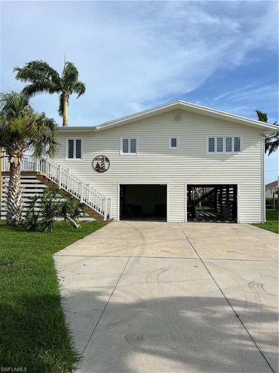 Live the Pine Island Waterfront Lifestyle! Escape to this beautifully remodeled gulf-access stilt home where every upgrade is already done and every day feels like vacation. This turnkey retreat blends modern comfort with the laid-back charm of island living—just bring your clothes and a toothbrush and start enjoying the water.
A Boater’s Paradise as you step outside onto your 2024 captain’s-walk dock, complete with a 13,000 lb. boat lift and a convenient fish cleaning station. Launch straight into Matlacha Pass with no bridges—just open water, world-class fishing, and endless boating adventures right from your backyard. Fresh, Modern, and Move-In Ready
Inside, the home shines with a full 2023 remodel to include:
New kitchen and appliances, new laminate flooring installed over an added ¾" plywood reinforcement for a solid floor. New roof, hot water heater, replumb, and updated electric panel.
Clean, bright spaces designed for comfort and easy coastal Island living at its best! Sip your morning coffee with the breeze on the balcony, spend afternoons on the water, and unwind with sunset views only Pine Island can offer. Whether you’re seeking a seasonal escape or a full-time waterfront lifestyle, this home delivers effortless living in one of Southwest Florida’s most peaceful boating communities.