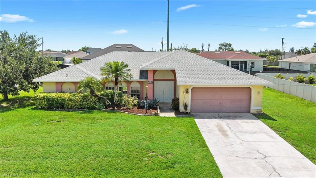 Seller is offering a driveway concession subject to buyers lender limitations/negotiable. Discover the freedom to live without HOA restrictions in this beautifully maintained home situated on an oversized triple lot in one of Northwest Cape Coral's fastest-growing neighborhoods. Offering the perfect blend of comfort, functionality, and Florida living, this residence features a spacious open-concept layout filled with natural light, creating an inviting atmosphere for both everyday living and entertaining. Recent updates provide added value and peace of mind, including a new roof (2024), new carpet (July 2026), a water heater (2020), and a new microwave (2025).

Step outside and imagine the possibilities with an expansive backyard offering plenty of room to add a custom pool, outdoor kitchen, detached garage, or create the private outdoor oasis you've always envisioned. With no HOA fees or restrictive regulations, you'll enjoy the flexibility to truly make this property your own. Conveniently located near shopping, dining, parks, public boat ramps, golf courses, schools, and the continued growth along the Burnt Store Road corridor, this home also offers easy access to Punta Gorda, Matlacha, Pine Island, and Cape Coral's world-renowned boating and fishing. Whether you're searching for a primary residence, seasonal getaway, or investment opportunity, this property delivers exceptional value, space, and endless potential in one of Cape Coral's most desirable and rapidly expanding areas.

Some photos include reality renovation/reality staging. *THIS PROPERTY INCLUDES DESIGN SERVICES, MAKING FURNISHING THIS PROPERTY EASY FOR YOUR BUYER.*