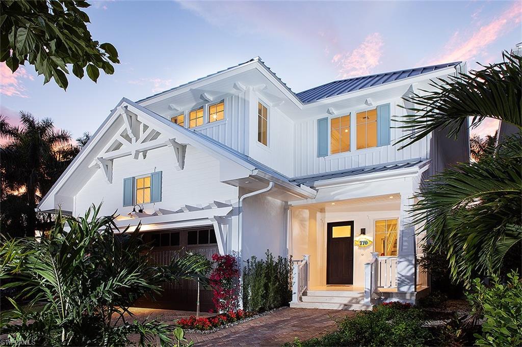 Introducing the Cottages Off Fifth, two luxury fully furnished single-family residences nestled along Park Street just steps to the famed 5th Avenue South Shopping and Dining District, the renowned tennis facilities of Cambier Park and the pristine beaches of Old Naples. Penned by MHK Architecture & Planning, constructed by Lotus Construction, LLC and masterfully appointed by Clive Daniel & Calusa Bay Designs, this 4-bedroom plus loft home offers a generously-sized interior with great room plan, ground floor master suite configuration and spectacular outdoor living space complete with private pool and spa, custom designed wet wall feature, fire pit, western exposure and lake view. Featuring “coastal cottage” design elements, this home will offer the finest in interior and exterior appointments. Construction features include CBS construction for first and second floors, Andersen impact windows, WolfSubzero appliances, custom Ruffino cabinetry, energy efficient spray-insulation, pre-wiring for custom shades, audio and security cameras, electric vehicle charger outlet in garage, natural gas feed. Please visit 770ParkStreet.com for more!