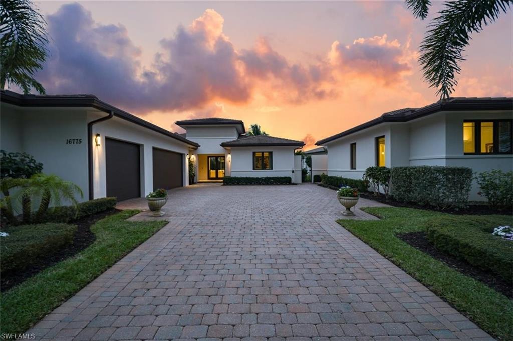 Spectacular resale that is 4 years young.  Welcome to 16775 Cabreo Drive in Mediterra.  This gorgeous London Bay built “Devonshire Model” with an extra separate guest casita/guest house is one of a kind.  Gorgeous curb appeal when you pull up.  Perfectly situated on this western exposure lot and 3 car attached garage.  Covered front porch with double door entry opens to this amazing open concept floor plan with soaring ceilings and walls of windows allowing all the Florida sunshine stream in.  Wood looking tiled plank flooring throughout the main living areas of the home.  Designer kitchen is perfect with white shaker cabinets on the perimeter and darker cabinets on the oversized island.  Tiled backsplash, quartz countertops, high end stainless appliance package, recessed and pendant lighting too.  Dining spaces include: Counter height at island, dining and covered lanai.  Oversized great room space with TV wall with custom millwork and accents, tray ceiling, large oversized sliders open the outside space from this area as well.  Owner’s retreat provides the perfect place the rest peacefully.  2 walk-in closets, Large walk-in shower and oversized vanity complete the space.  Den space is tucked away to accomplishment whatever you need too.  Then there are 2 additional guest suites in the main house both with double closets and en-suite baths.  Then there is a separate one bedroom/studio Casita or guest house with en-suite bath and private access.  Outside under the covered lanai enjoy the western views, fully equipped outdoor kitchen with refrigeration, sink and built-in grill.  Glistening pool and spa await your time relaxing in the Florida sunshine.  Fully screened lanai cage and expanded decking provide the perfect sot to watch the sun set.  Lake views in the rea of the home and landscaped area at the front of the home with no other homes across the street provide the upmost of privacy.  Whole home generator, Natural gas community, flat tiled roof, storm protection and so much more.  Mediterra’s world-class amenities—including a beach club, tennis, pickleball, wellness center, and two Tom Fazio-designed golf courses—this home offers the perfect blend of luxury, style, and functionality