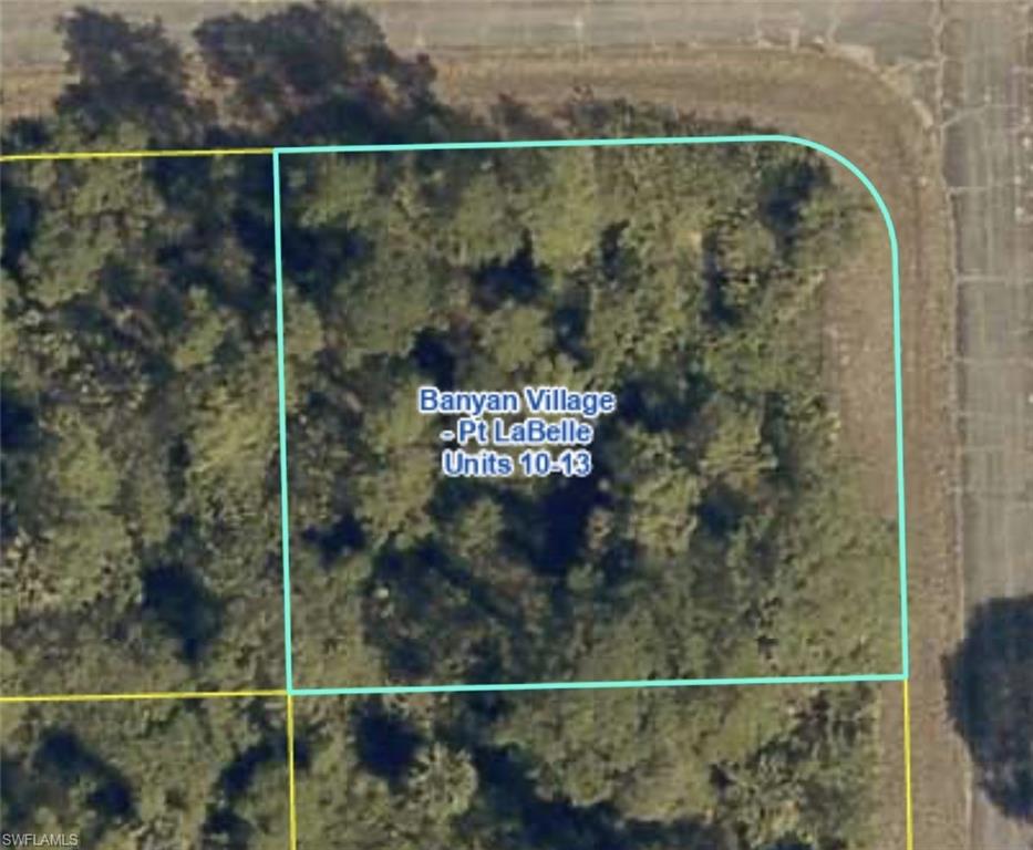 Oversized corner lot (0.31 acres) for sale in Banyan Village, a Port Labelle Community that is up-and-coming and growing fast. This is a fantastic opportunity to invest in land today or build your dream home here. Take advantage while prices are low. Enjoy the quiet and peaceful neighborhood and Florida weather year-round!