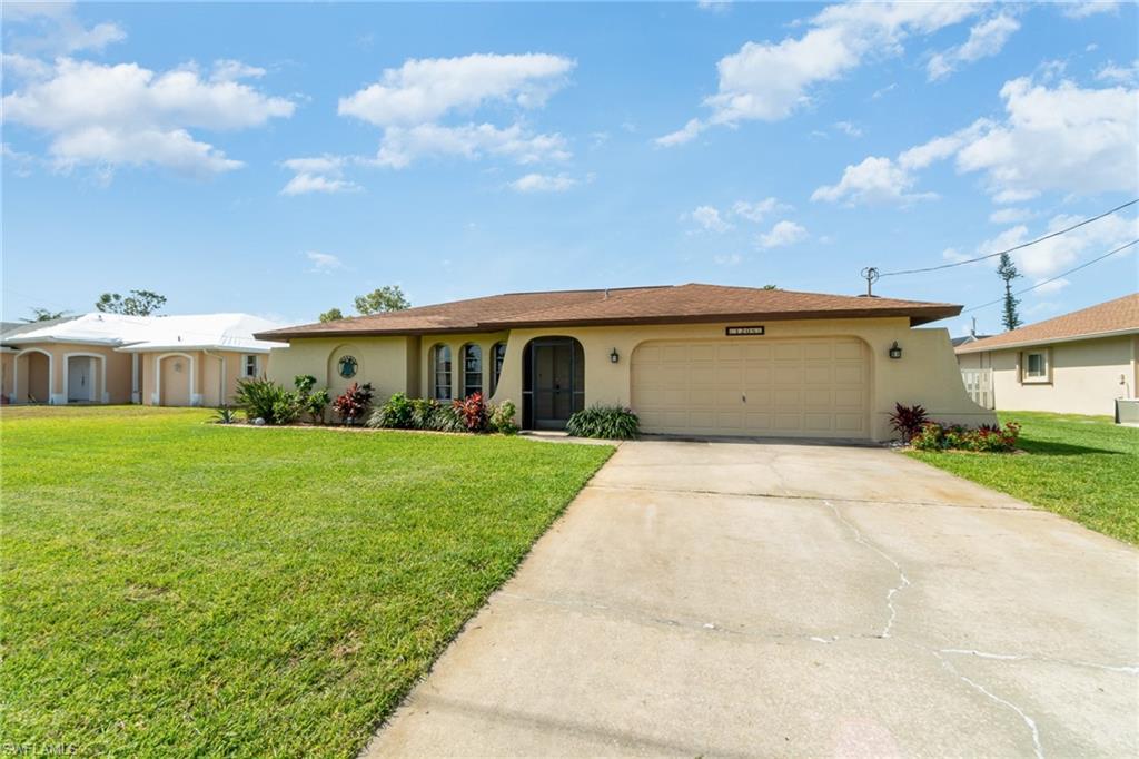 Welcome to your own slice of paradise!  This adorable 3 bedroom, 2 bath southern exposure home boasts a split floor plan, new vinyl plank flooring in the living room, tile in the family/dining area. Sliders lead from the family/dining room to the lanai. Oh...did I mention the SALTWATER POOL surrounded by beautiful pavers and perfect for taking a dip on hot summer days?  The large fenced backyard provides ample privacy and space for outdoor activities with plenty of room for Fido to play. NEW ROOF HAS BEEN SCHEDULED FOR INSTALLATION THE WEEK OF 5/8.  A/C was installed in 2020. Don't miss out on this incredible opportunity to make this home your own. Contact an agent today to schedule your private showing!